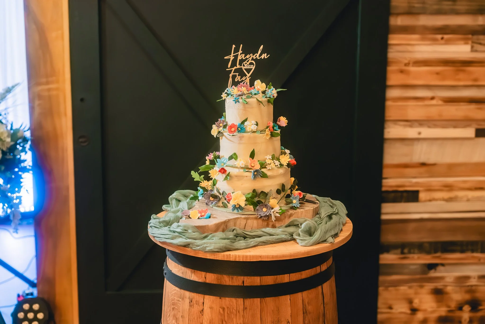 Bride and groom cutting their wedding cake