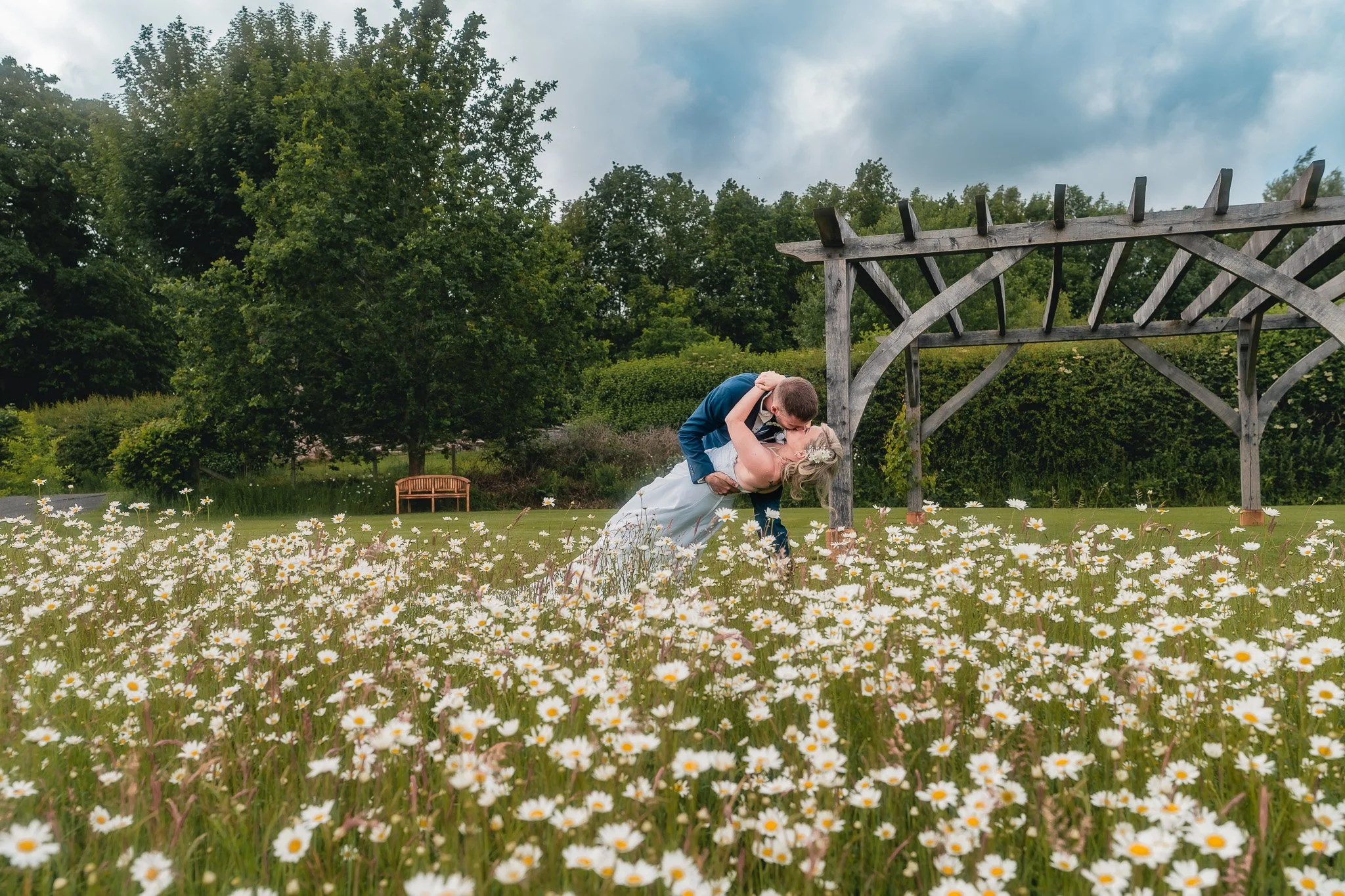 Bride and groom walking together at Barn at Brynich
