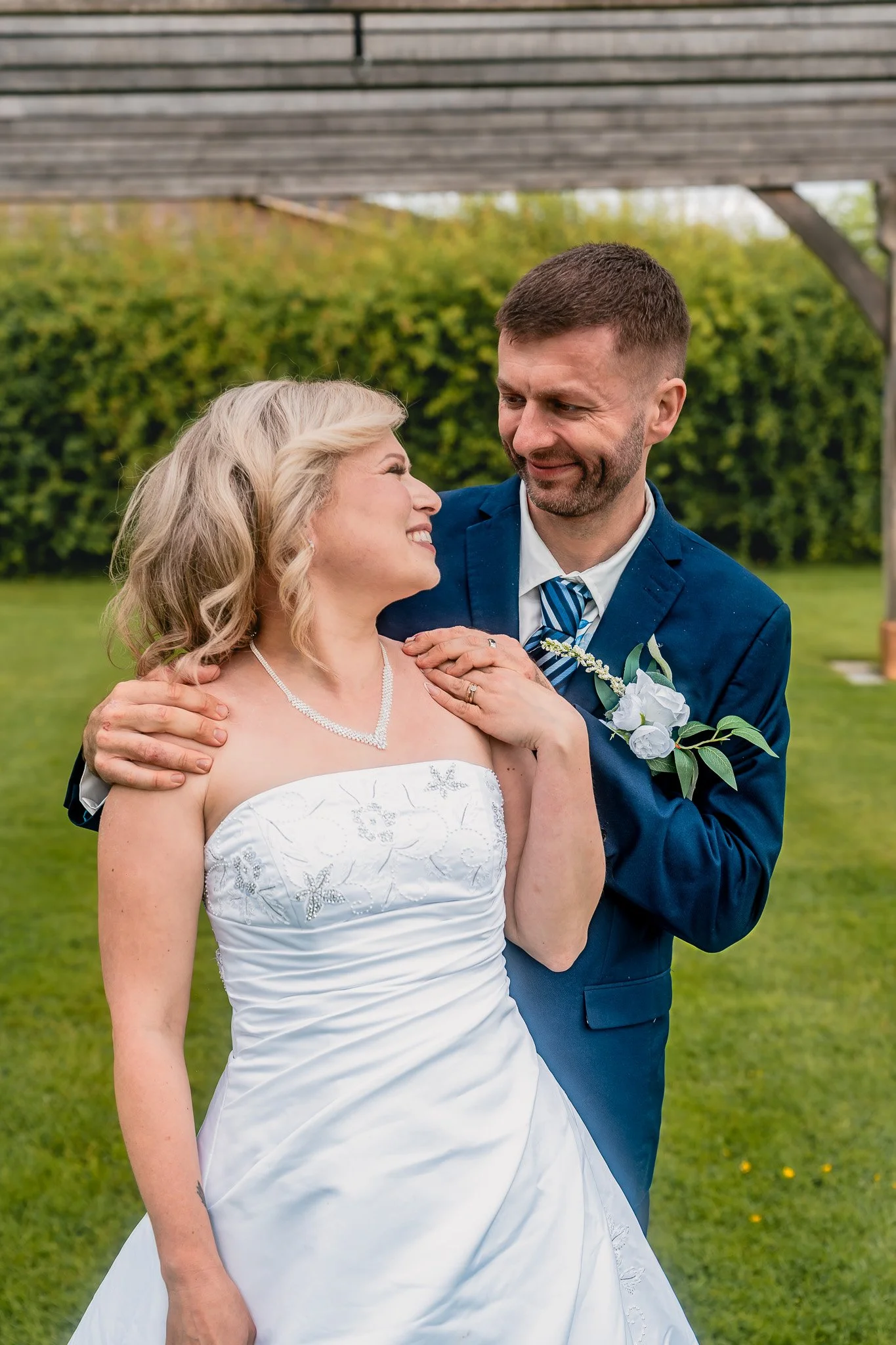 Bride and groom walking together at Barn at Brynich