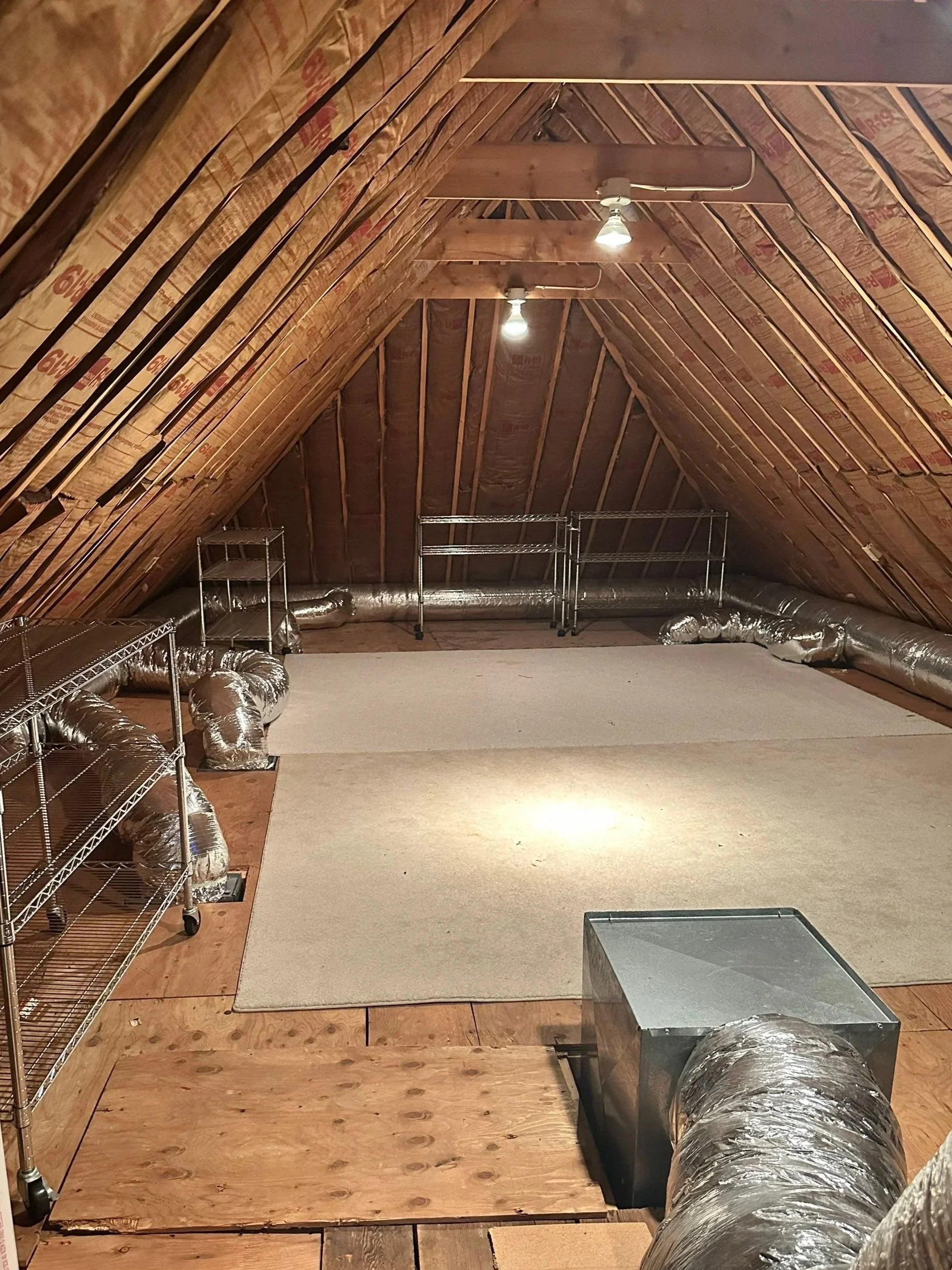 Clear attic without clutter that has been downsized and cleaned in Newton.