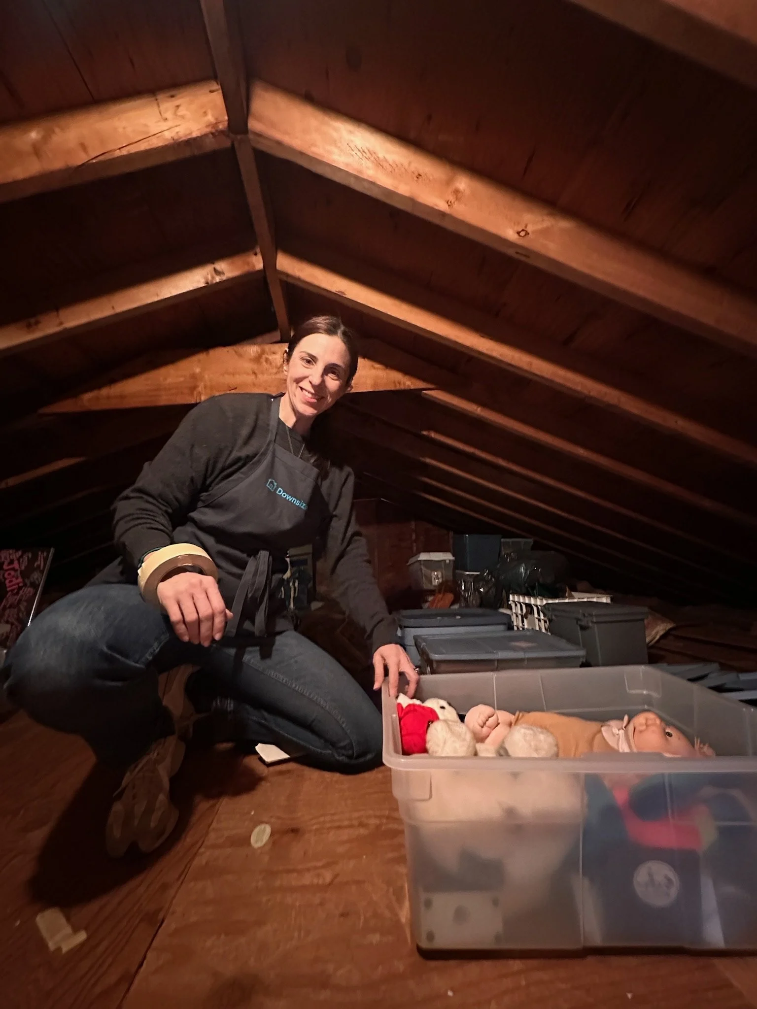 Senior move manager working to clean out an attic in Lexington, Mass.