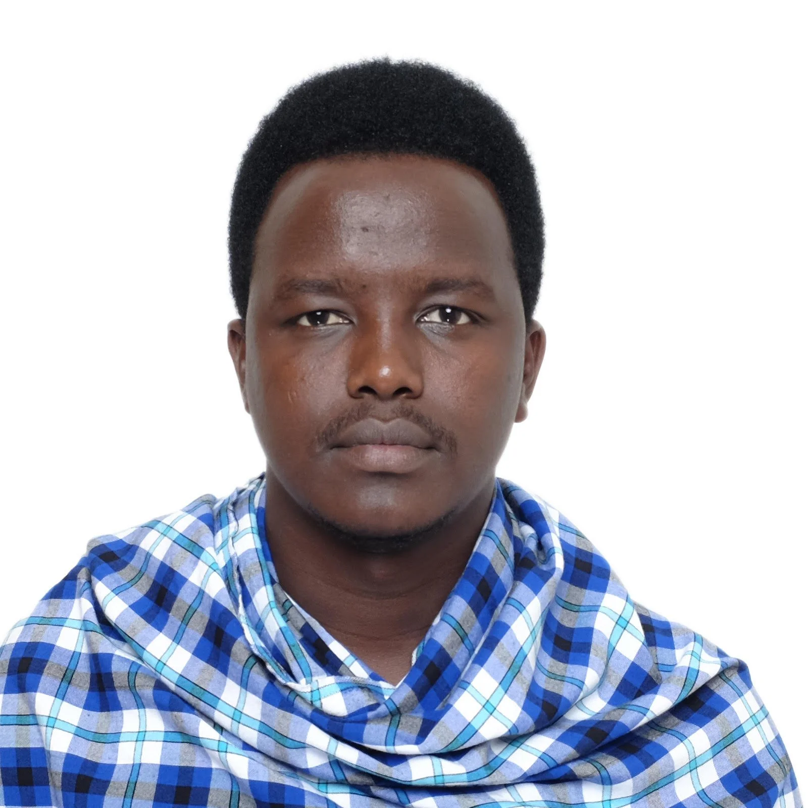 Portrait of a young man wearing a blue and white checkered shirt.