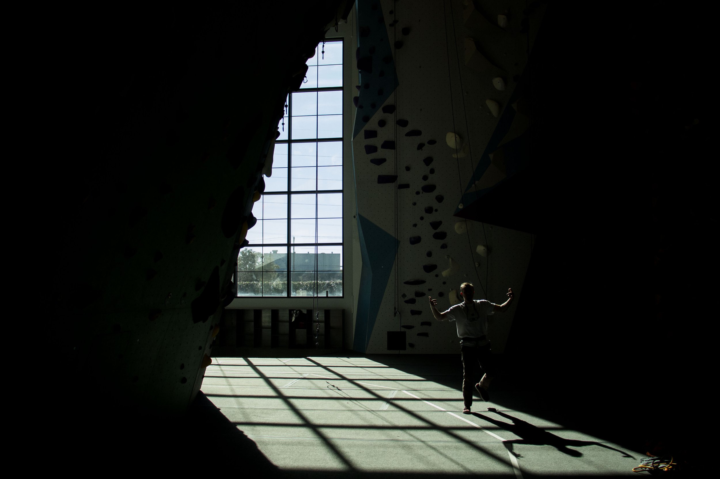 "Dyno" Dan jumps with joy after spotting his friend across the gym at Movement Gyms on Feb. 3, 2024. 