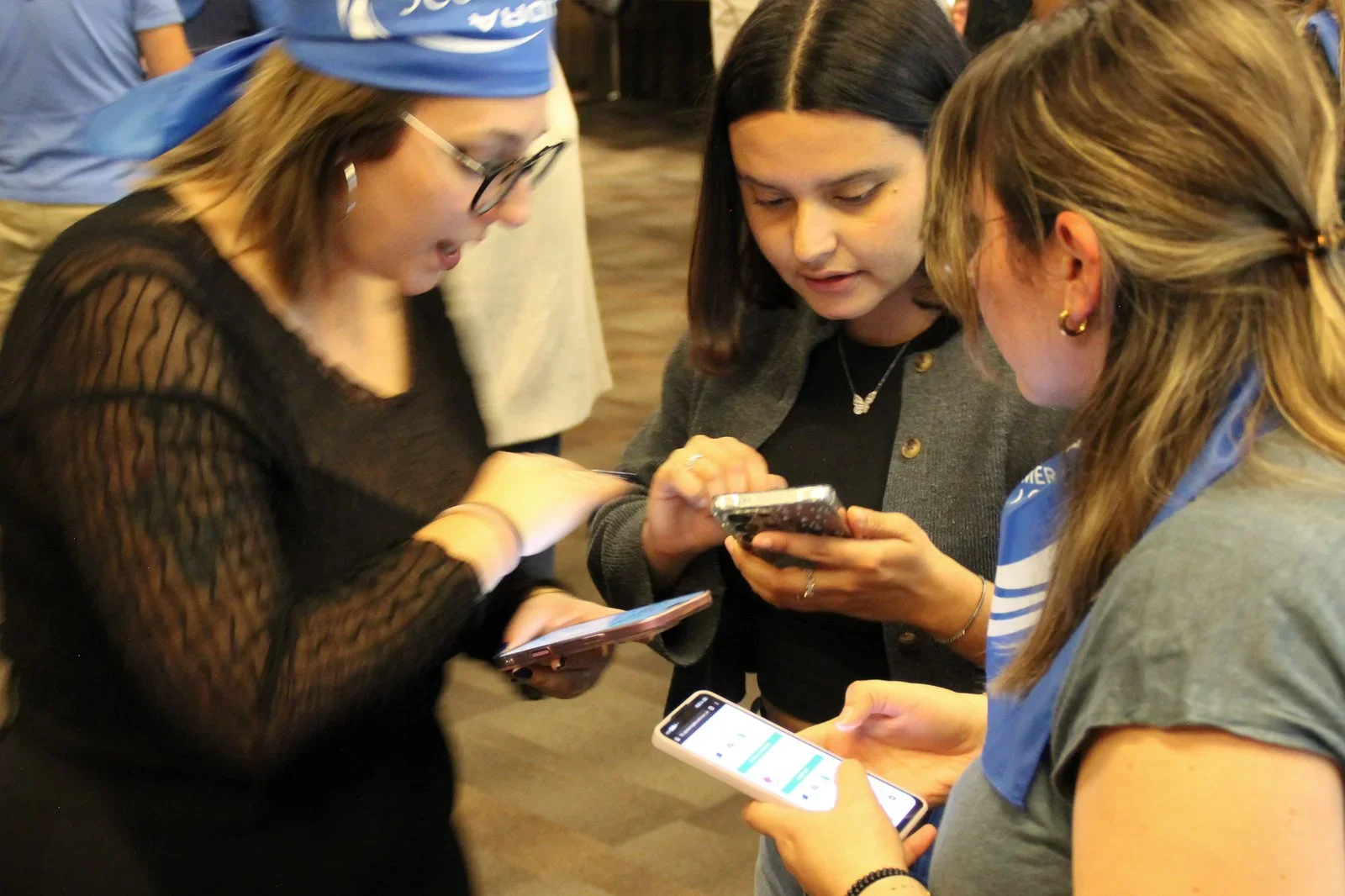 Participants completing a challenge on an app-based scavenger hunt