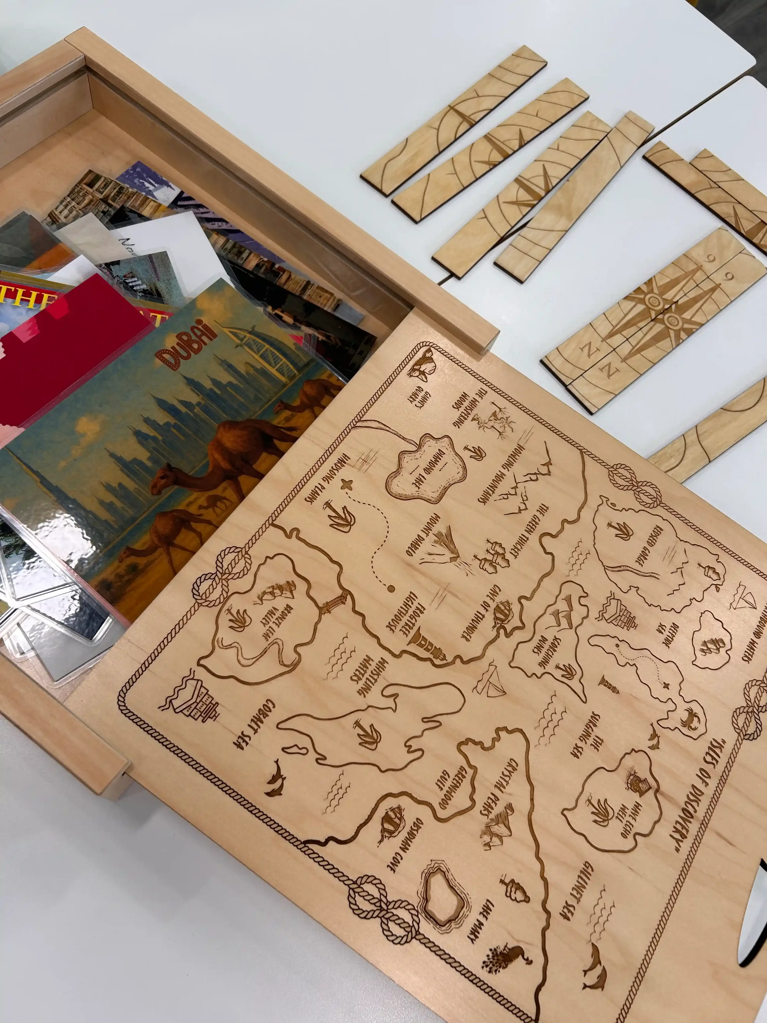 Participants working on portable escape room puzzle props at an event table