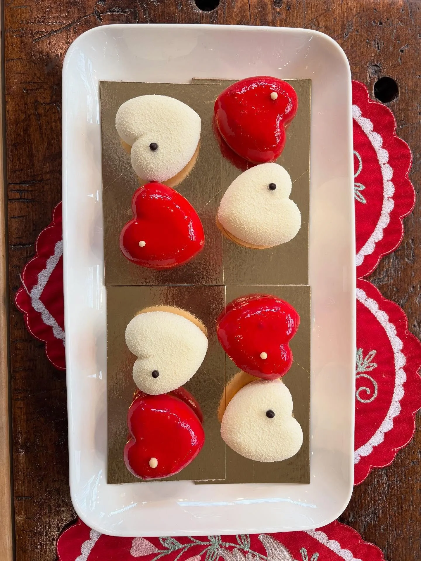 Red Hearts
Vanilla Mousse w/ Raspberry/Rose Water Gele&eacute;

White Hearts
Double Chocolate Mousse w/ Salted Butter Caramel &amp; White Chocolate 

By @stgermainbakery