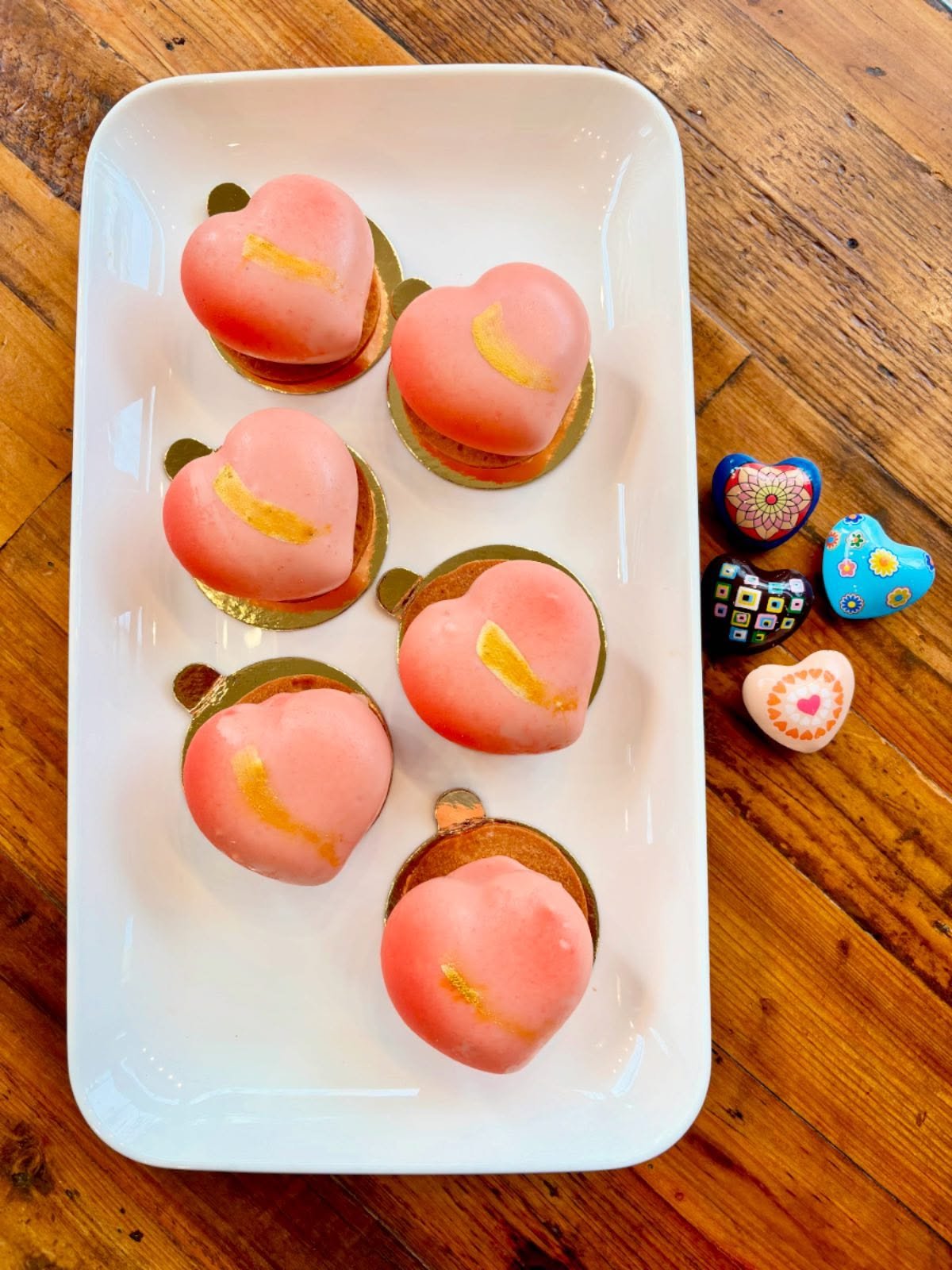 Strawberry Sweethearts 🍓

Dark Chocolate Ganache, Red Fruits, Fig Jam, Cayenne Pepper and Rose

By @stgermainbakery