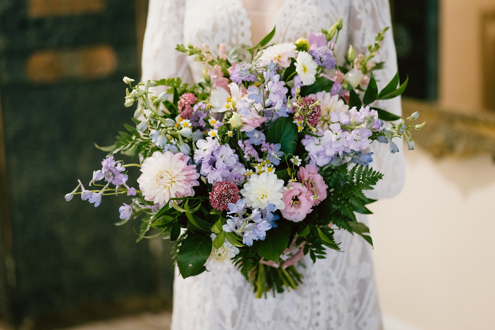 Close-up of a wildflower bridal bouquet featuring locally sourced blooms