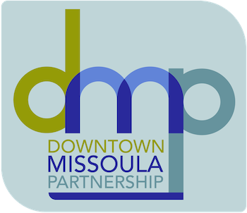 Logo for Downtown Missoula Partnership with stylized lowercase letters 'd', 'm', 'p' and text 'Downtown Missoula Partnership'