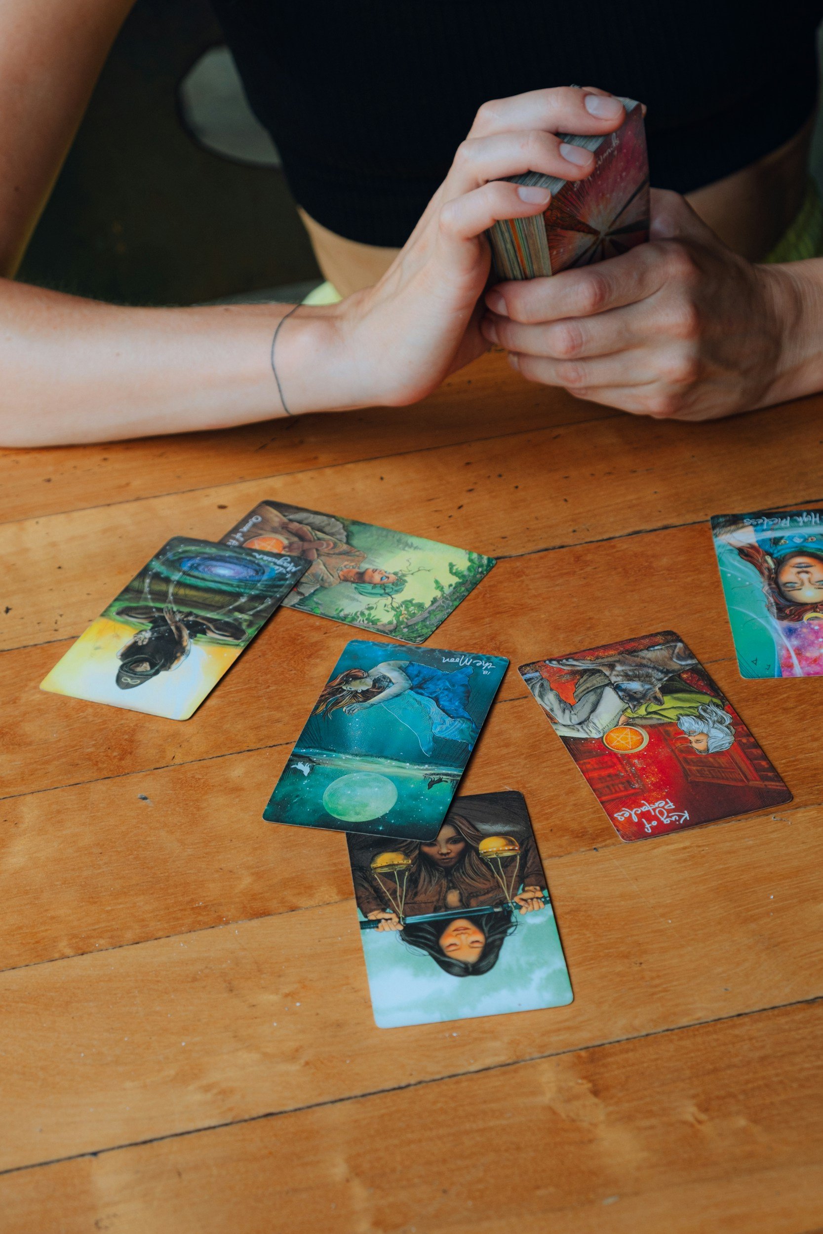Image of person reading a Tarot Spread