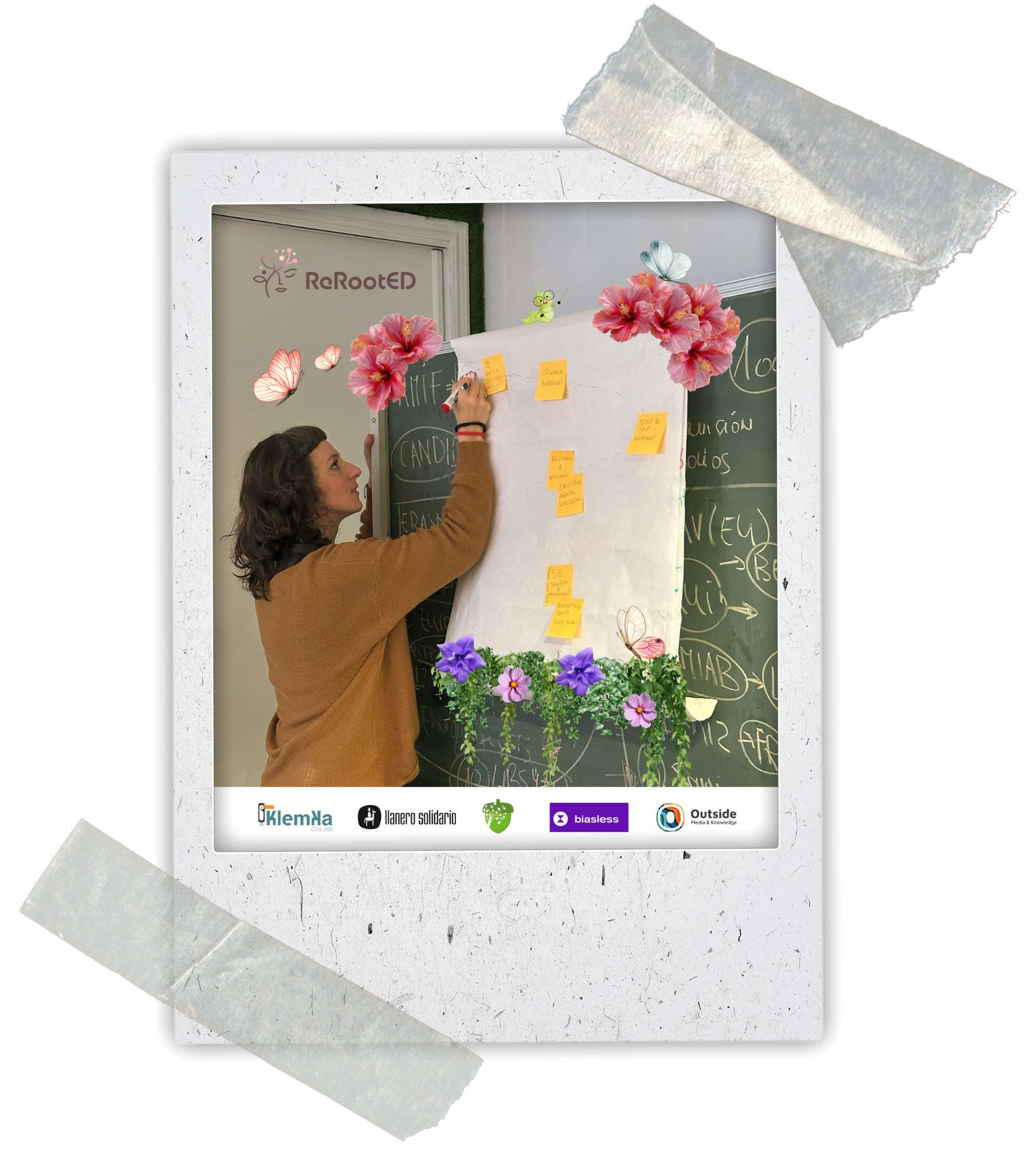 A person writing on a large sheet of paper with yellow sticky notes attached, surrounded by pink flowers and butterflies in a classroom setting. Logos of organizations at the bottom include KlemYa, Llanero Solidario, Biasless, and Outside.