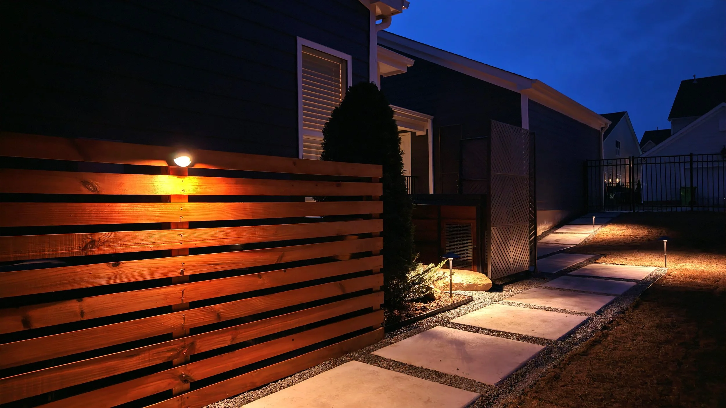 Custom carpentry, lighting, cold plunge, and hardscape design in Raleigh, NC