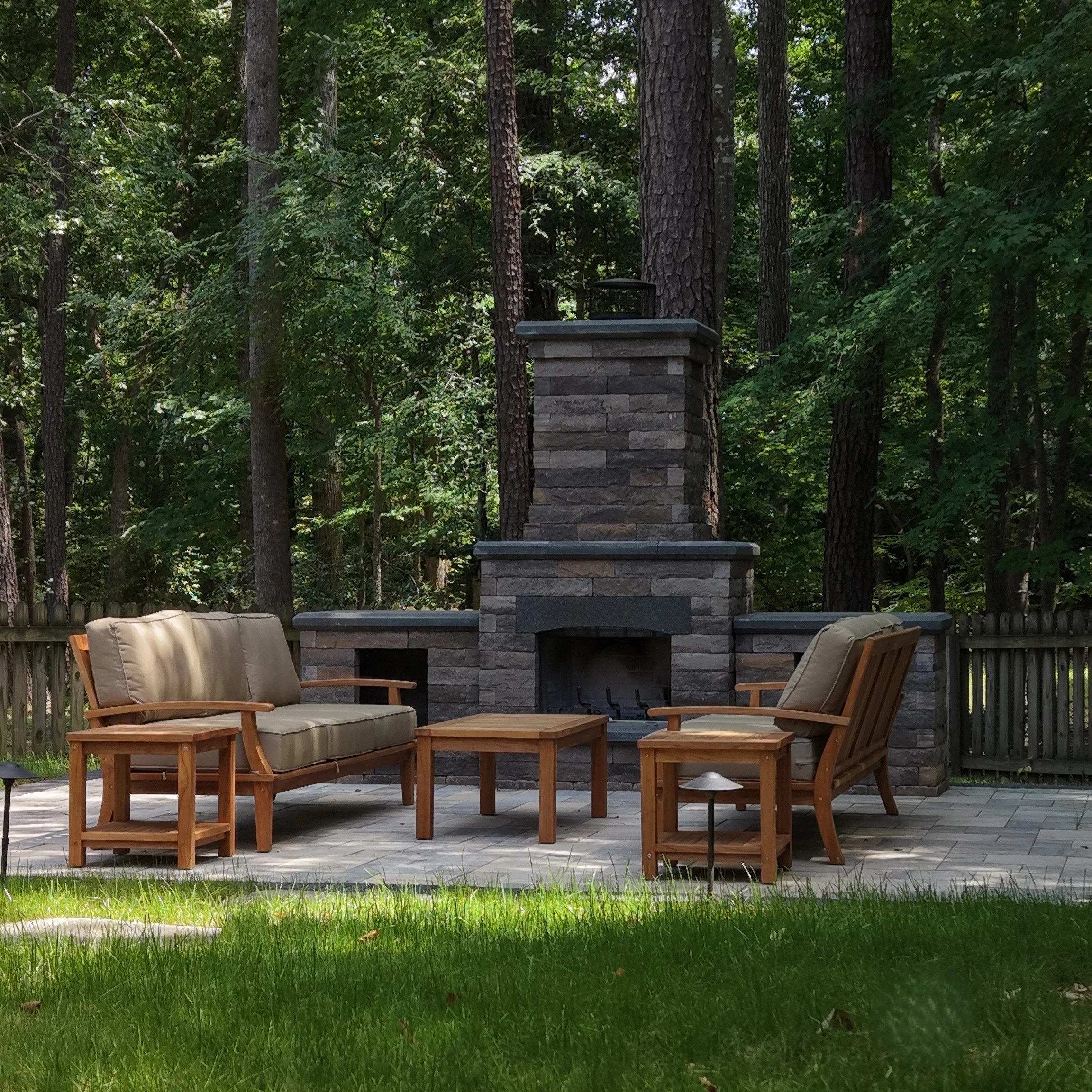 Outdoor fireplace and paver patio in Cary, NC