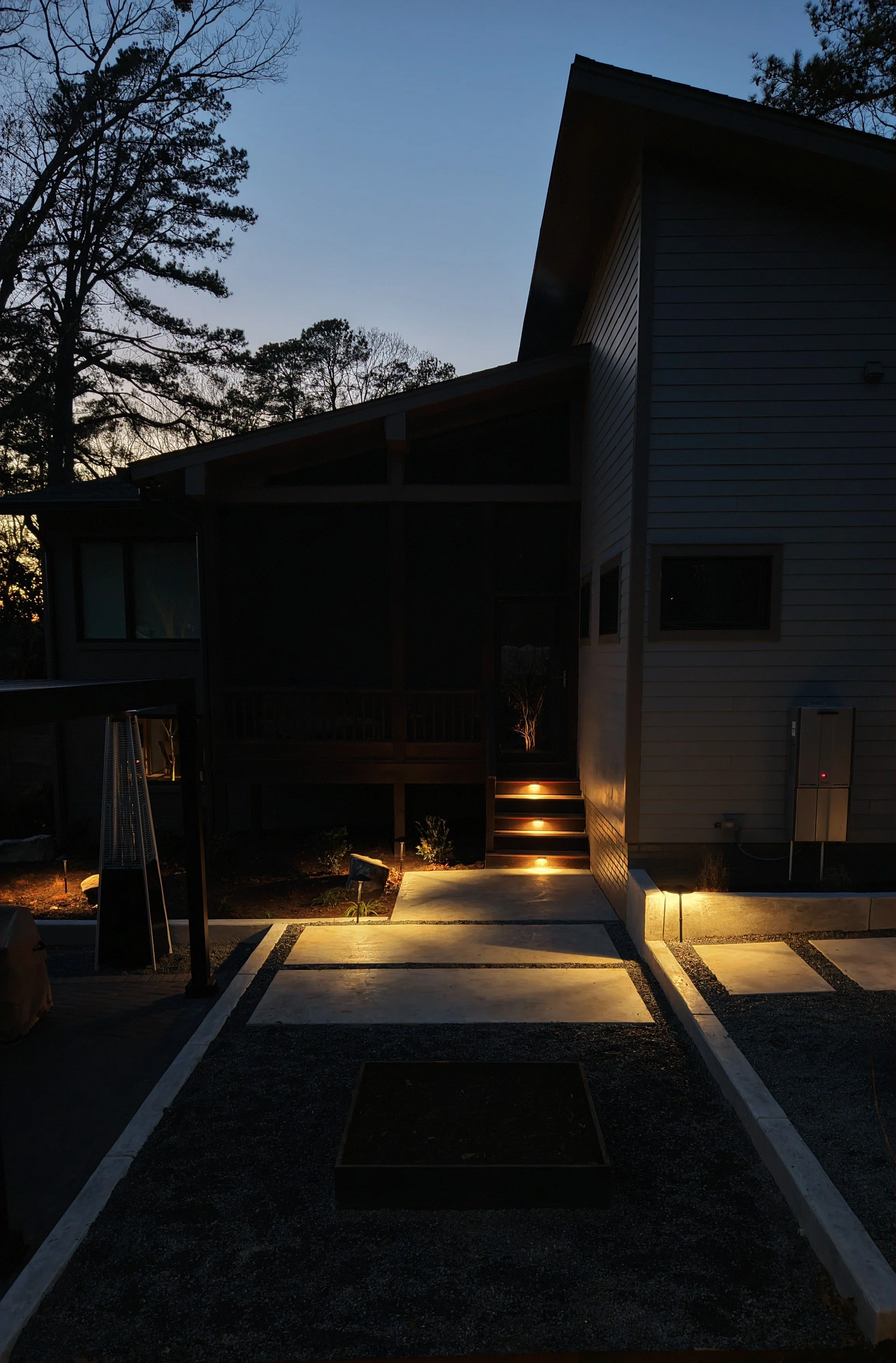 Concrete slabs with landscape lighting design in Cary, NC