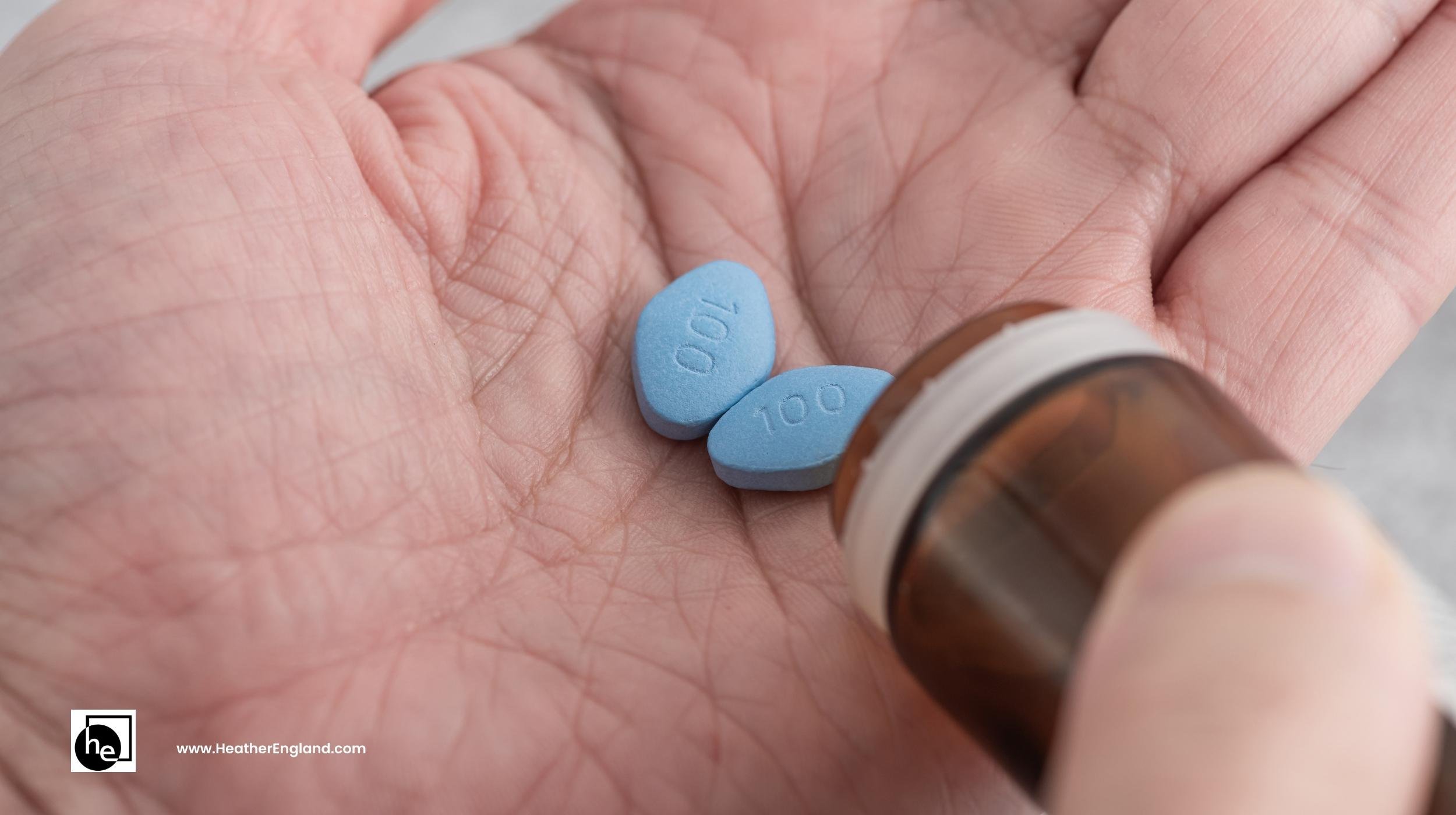 man shaking two blue erectile dysfunction pills into his open palm