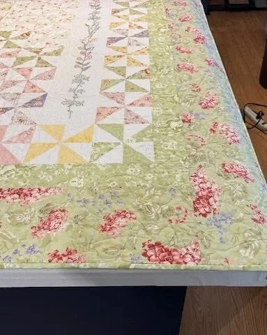More details showing the original quilt and its border fabric
