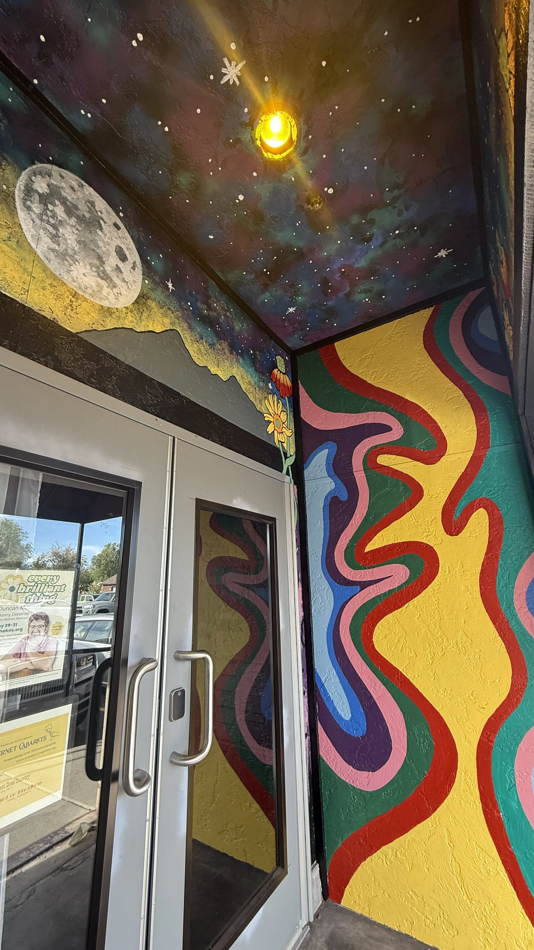 The east wall section of the mural at the entryway for Beaver Street Theatre