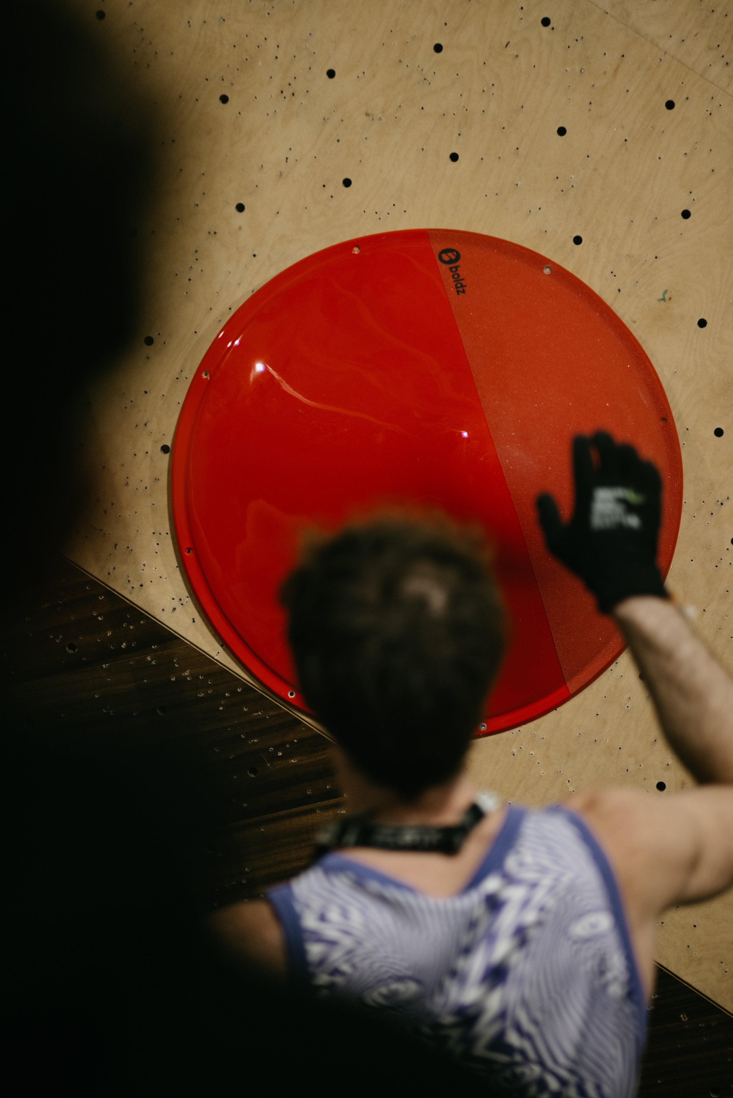 Routesetter preparing the finals for Tba 4 at Climbing District Paris on Boldz Holds Double texture Volumes

