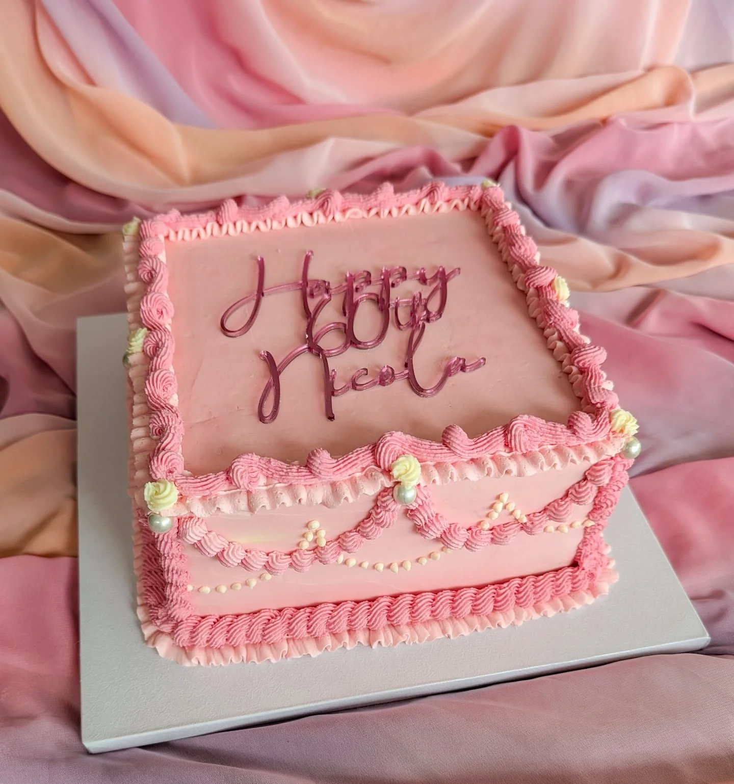 ✨ Layers of pink, pearls, and buttercream frills to mark Nicola&rsquo;s day in style 🎂