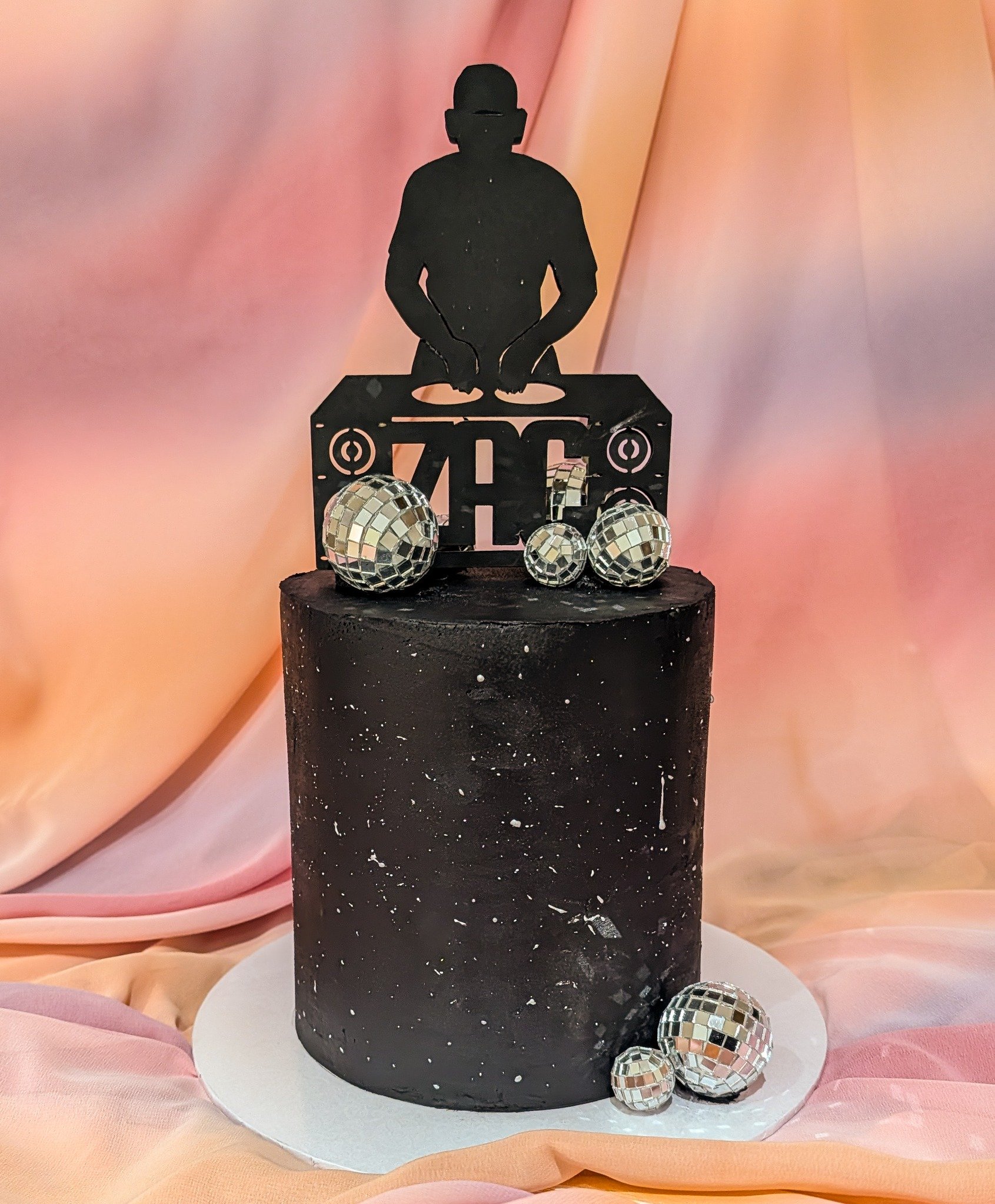 DJ-themed birthday cake with disco ball details and Biscoff sponge inside 🪩
This one was made for a music lover and kept quite clean and simple, with the topper doing most of the talking.

I love making cakes around people&rsquo;s interests, it&rsqu