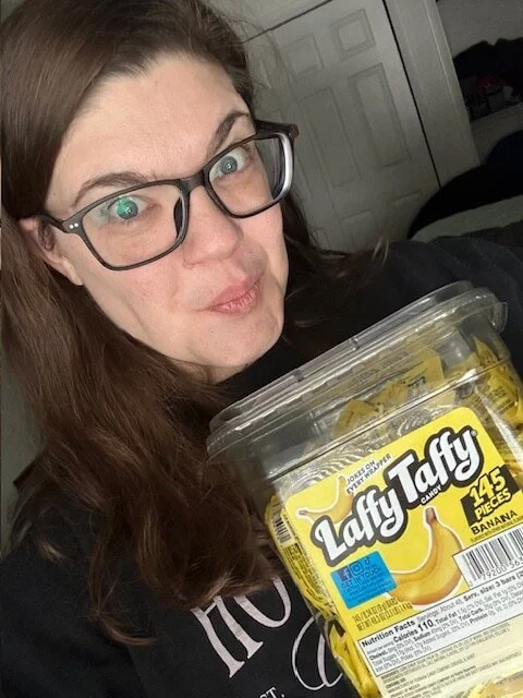 Sarah with a 3lb box of Banana Laffy Taffy.