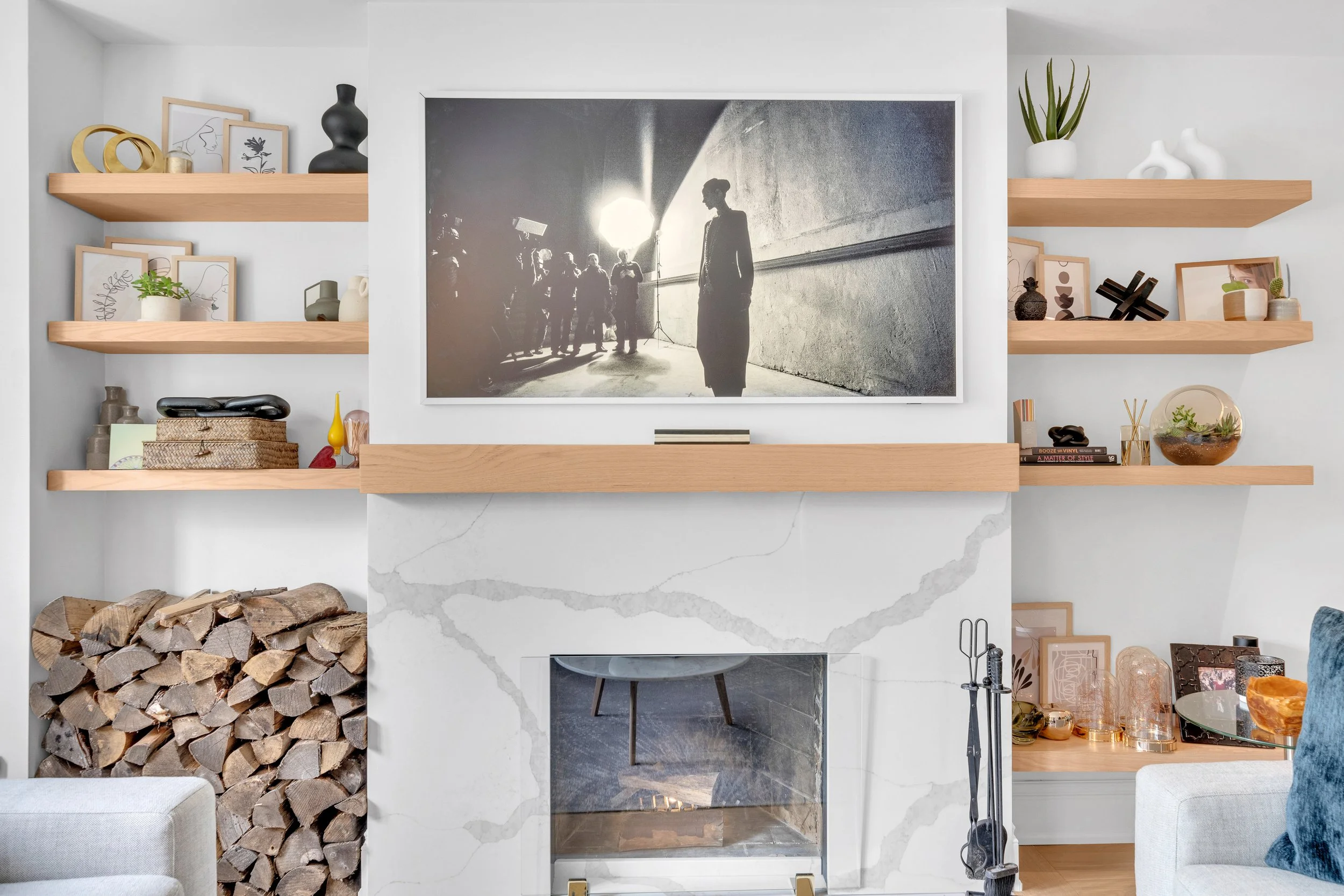 modern living room with fireplace and decorative shelves