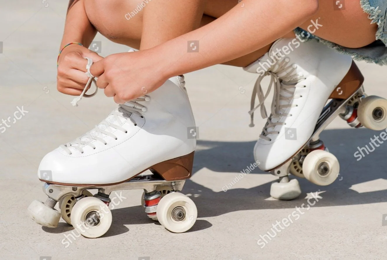stock-photo-close-up-detail-of-skater-s-hands-tying-the-laces-of-a-roller-skate-1968420055.jpg
