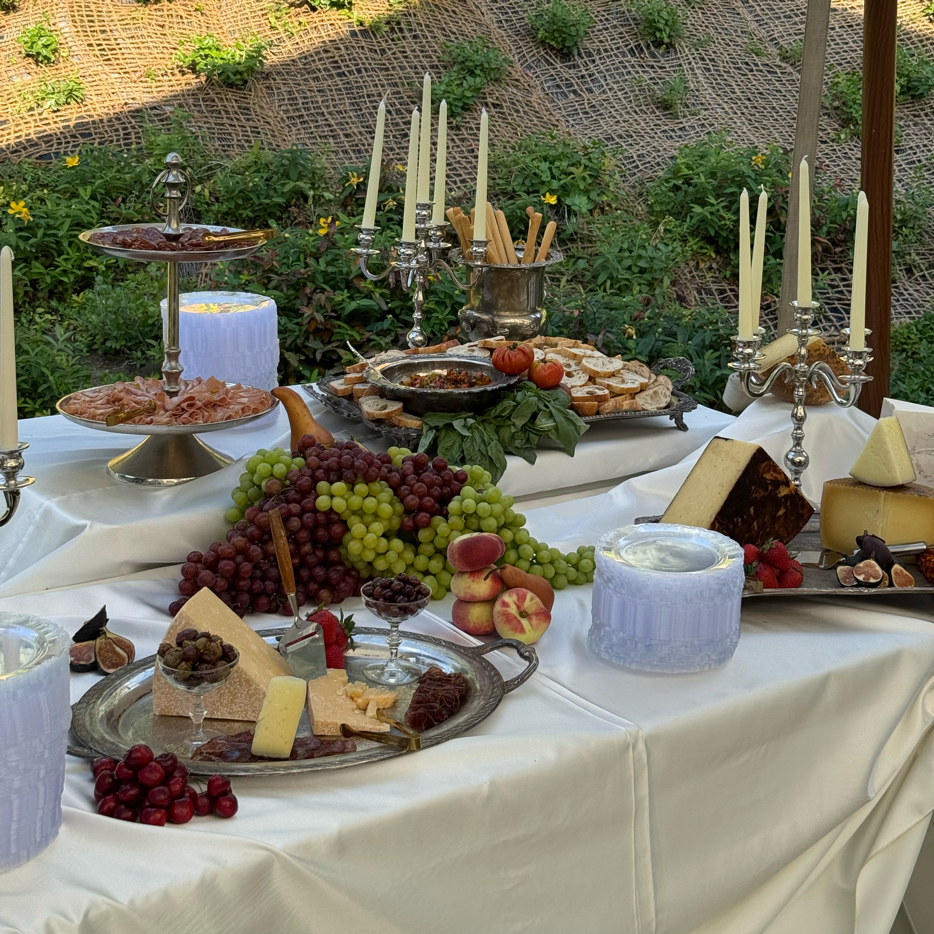 Food styling for a summer backyard wedding in Utah inspired by the styling traditions of France and Italy