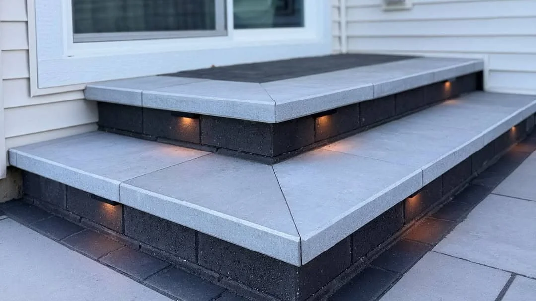 Inviting paver walkway connecting landscape design and outdoor kitchen in Wheaton, IL