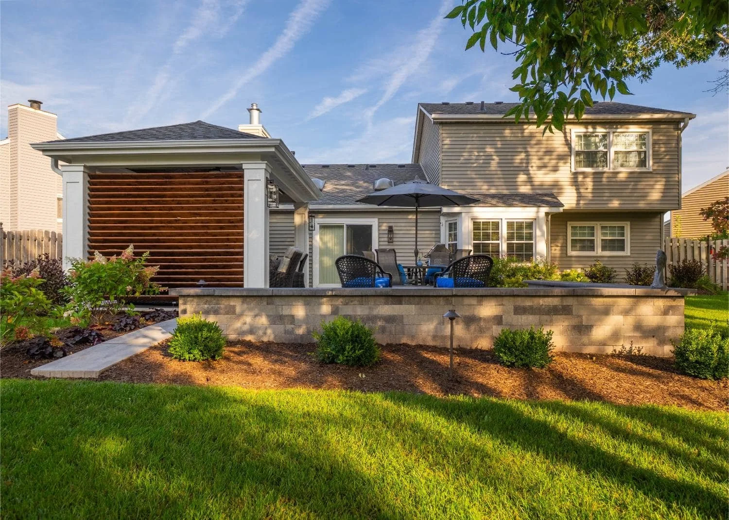 Seamless patio design connecting fire pit area and walkway in Barrington Hills, IL