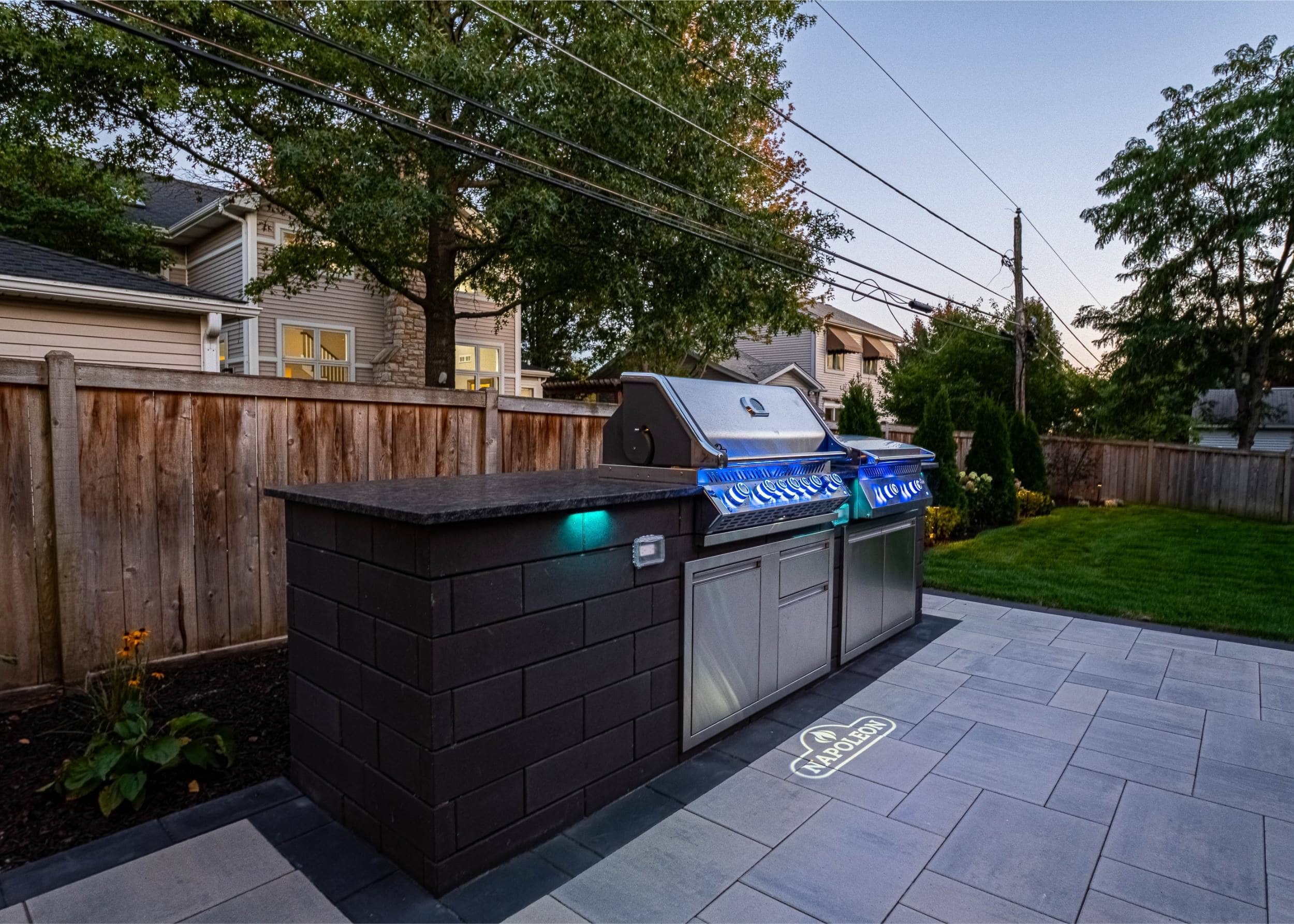 A high-end paver driveway by Apple Landscape Design in Hinsdale, IL