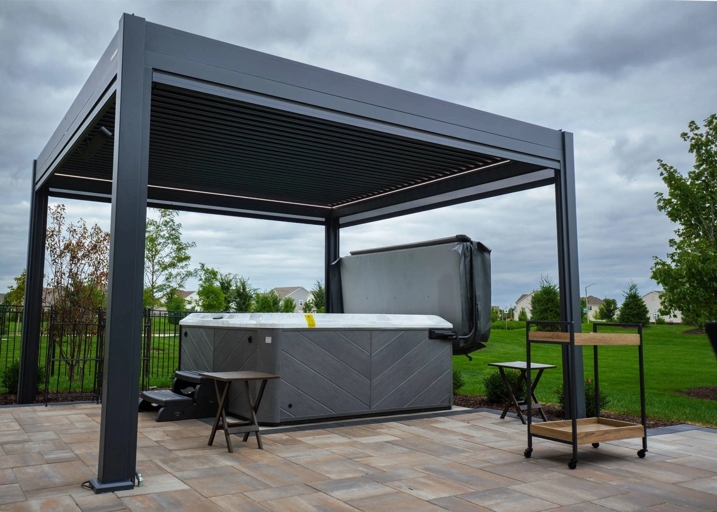 Custom backyard design with outdoor kitchen and paver patio in Plainfield, IL