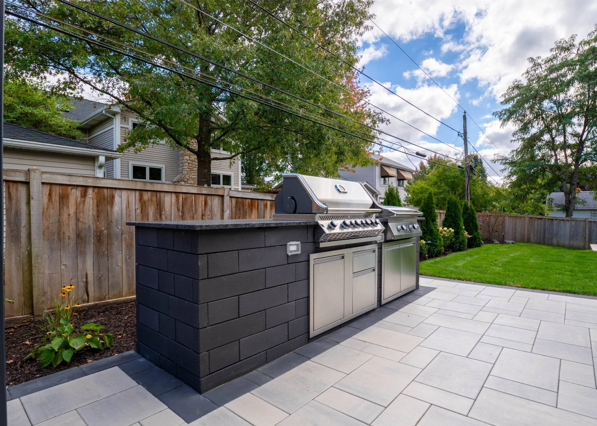 A refined paver walkway connecting outdoor zones in Hinsdale, IL