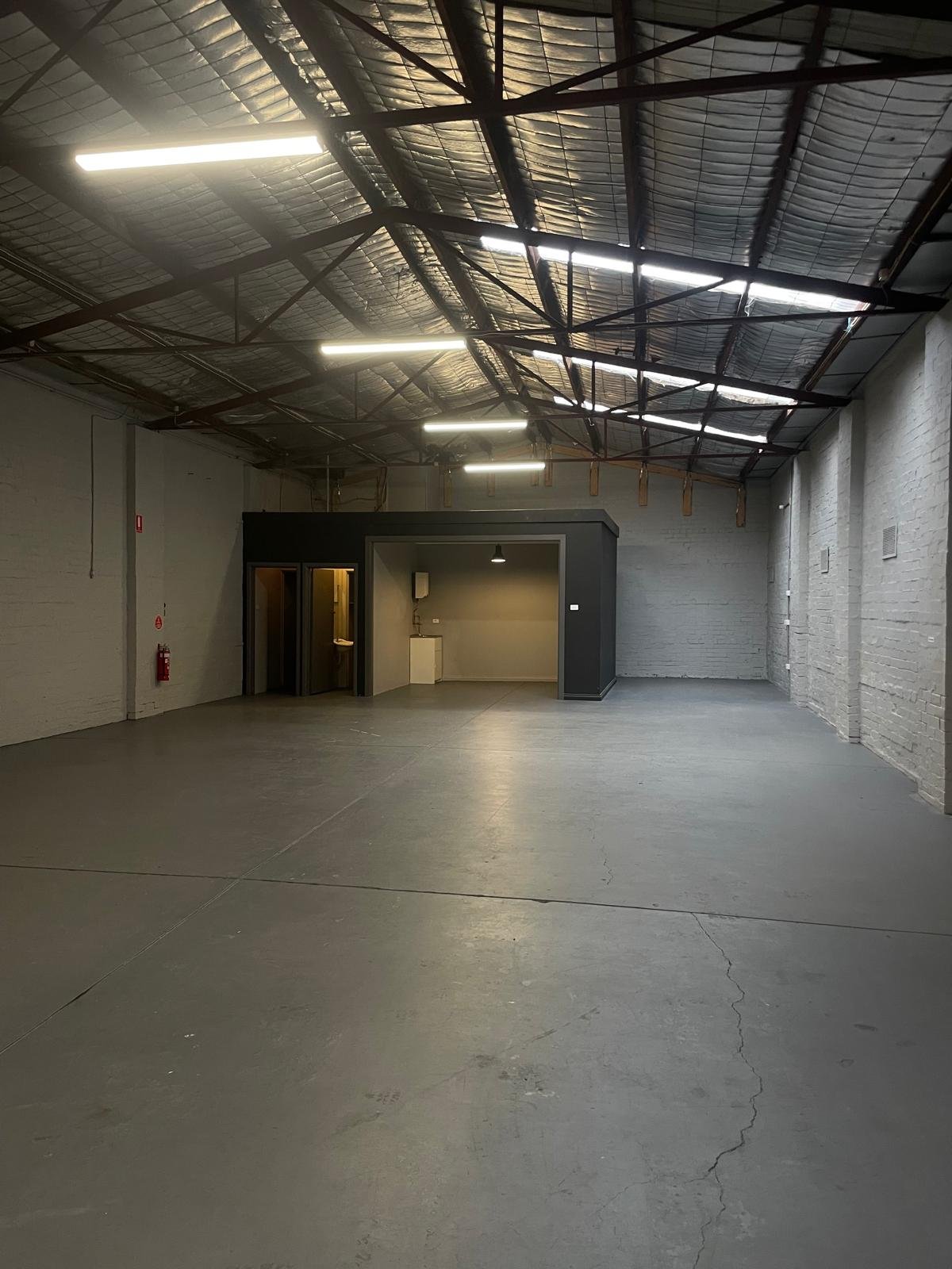 Interior progress image of Viacon Warehouse, highlighting ongoing construction in the main operational area.
