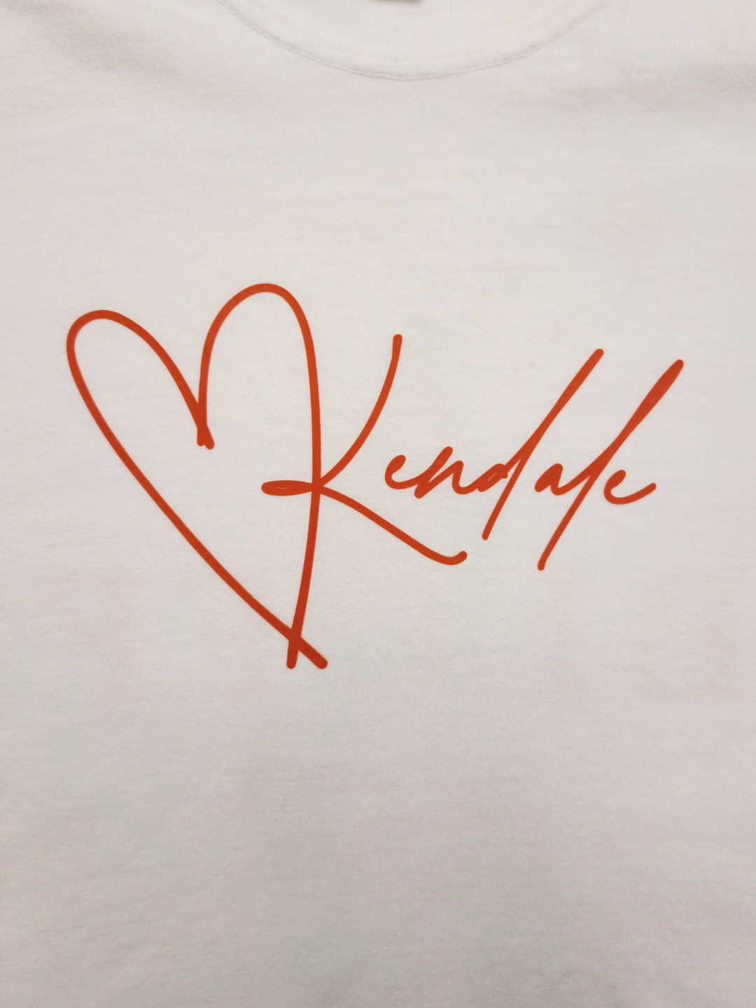 Kendale signature in red on a white background.