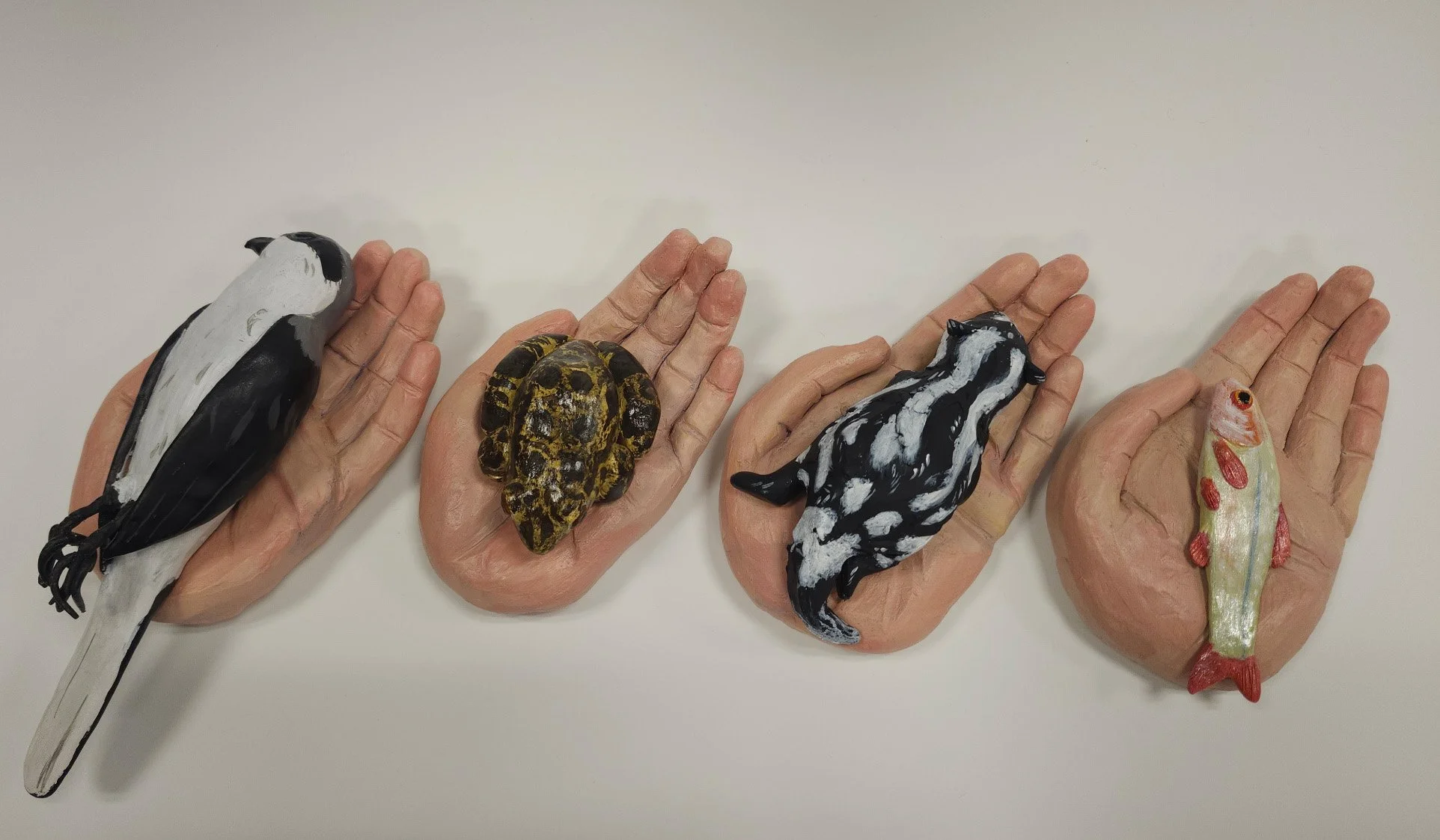 In The Palm of Your Hand, (largest) 8"x4"x2.75", 2025, Ceramic, Paint 