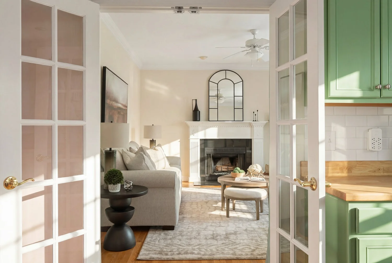 Signature interior photo of a bright living room with fireplace in Pittsboro, NC