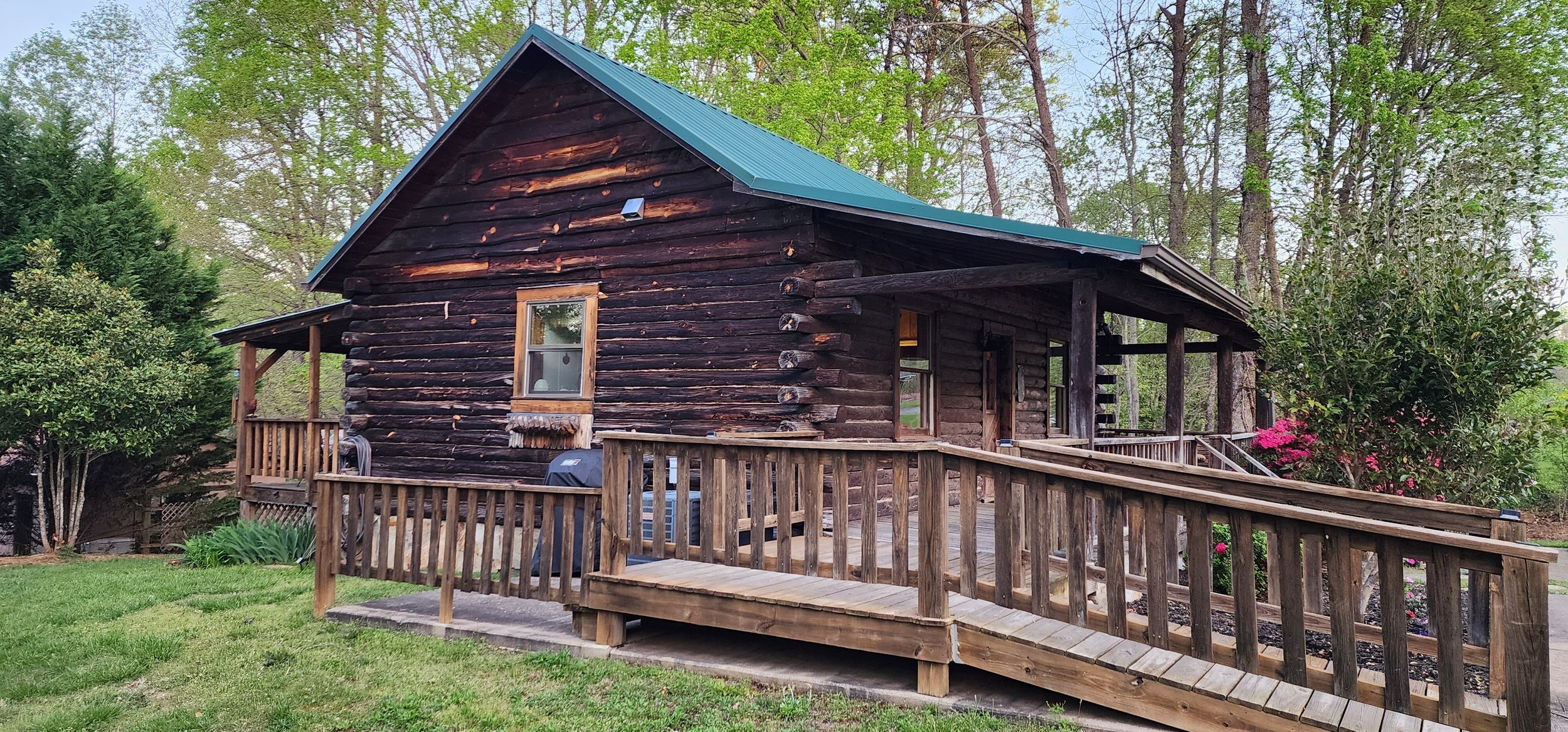 This vintage cabin was sunburned and grimy. Its new owners wanted to clean it up but keep its rustic charm to use as an Airbnb. They opted for a wash over media blasting.