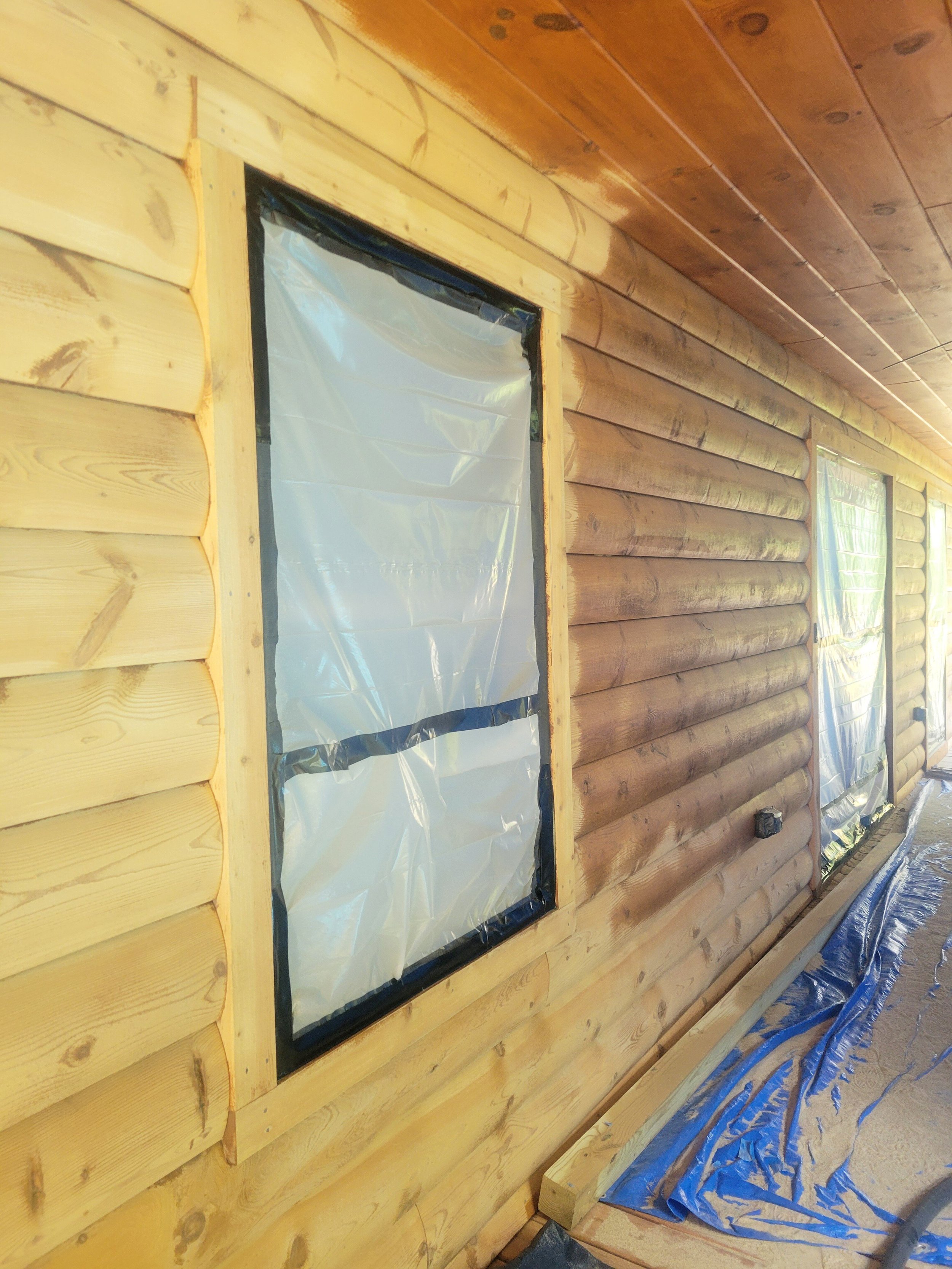 Covered porch partly blasted.