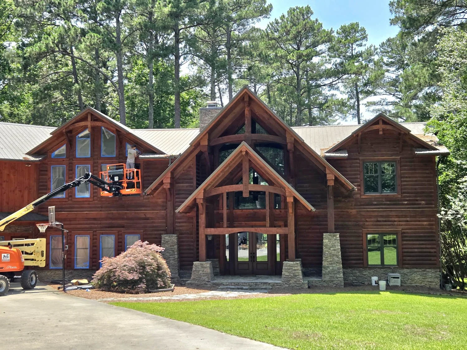 Here we are beginning to prep for the chemical strip. It's visible how dark and splotchy the oil stain had gotten after only three years.