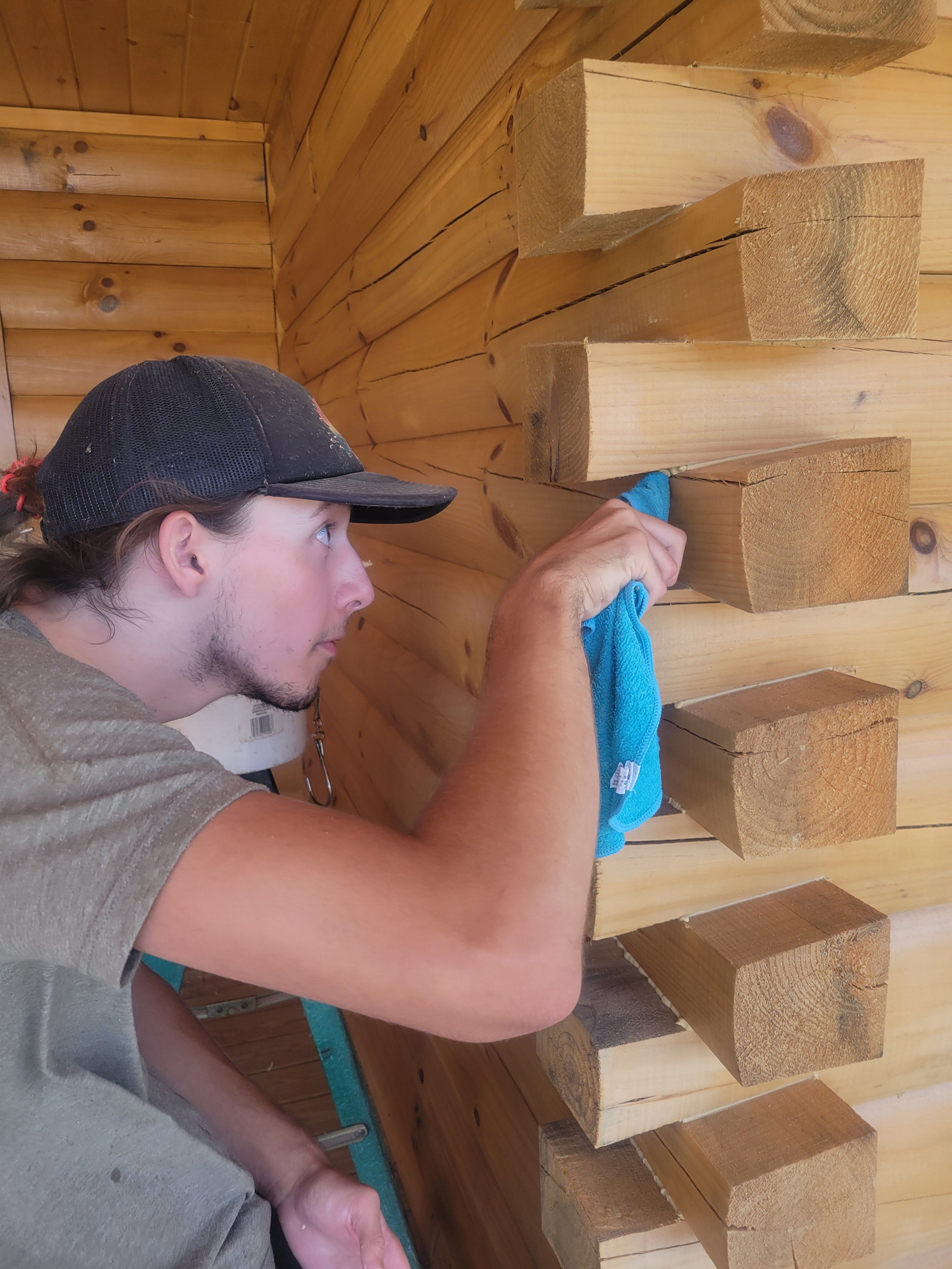 Attention to detail ensures clean caulk application.