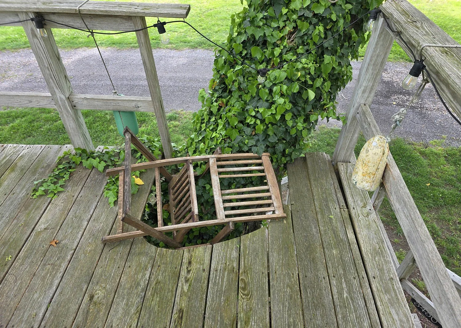 They asked us to rebuilt the stairs on the opposite side of the landing, as well as repair the deck floor so that their grandchildren and pets would not fall through this big hole they'd stuffed with a chair temporarily...