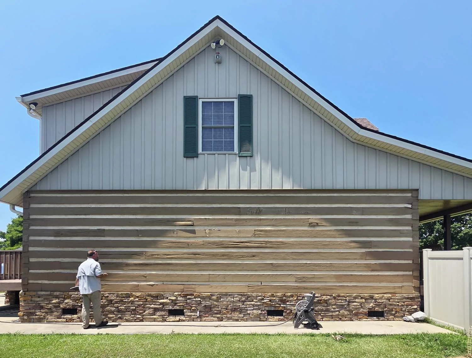 The owners had paint on the home for many years and with the moisture of the seaside air, it took its toll. They were at the end of their rope patching the rot on this wall especially, and called in the experts.