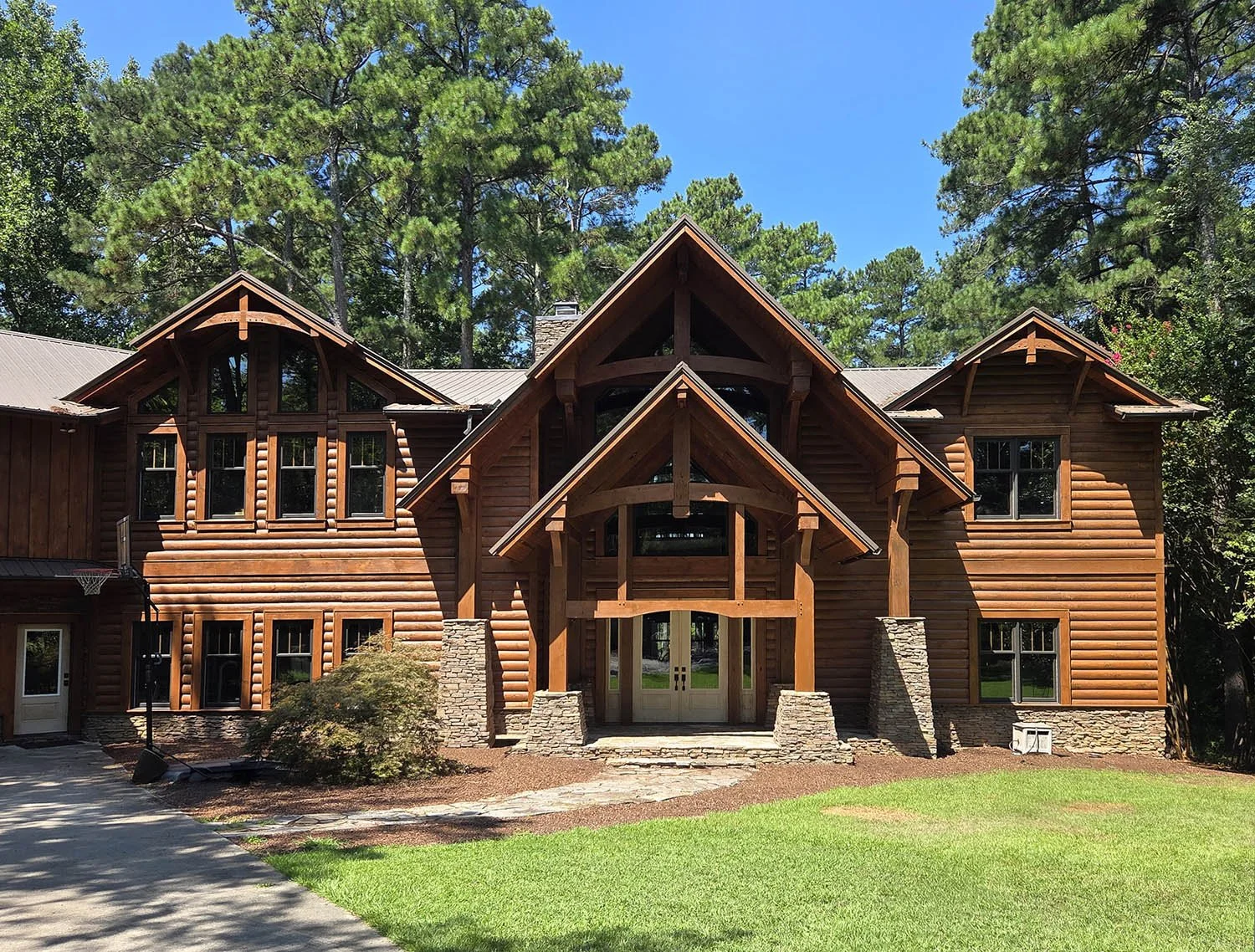 All finished! Re-stained with Perma-Chink System's  Lifeline Prelude, Ultra-7 in Hazelnut, and Advance Clear Coat, satin. 