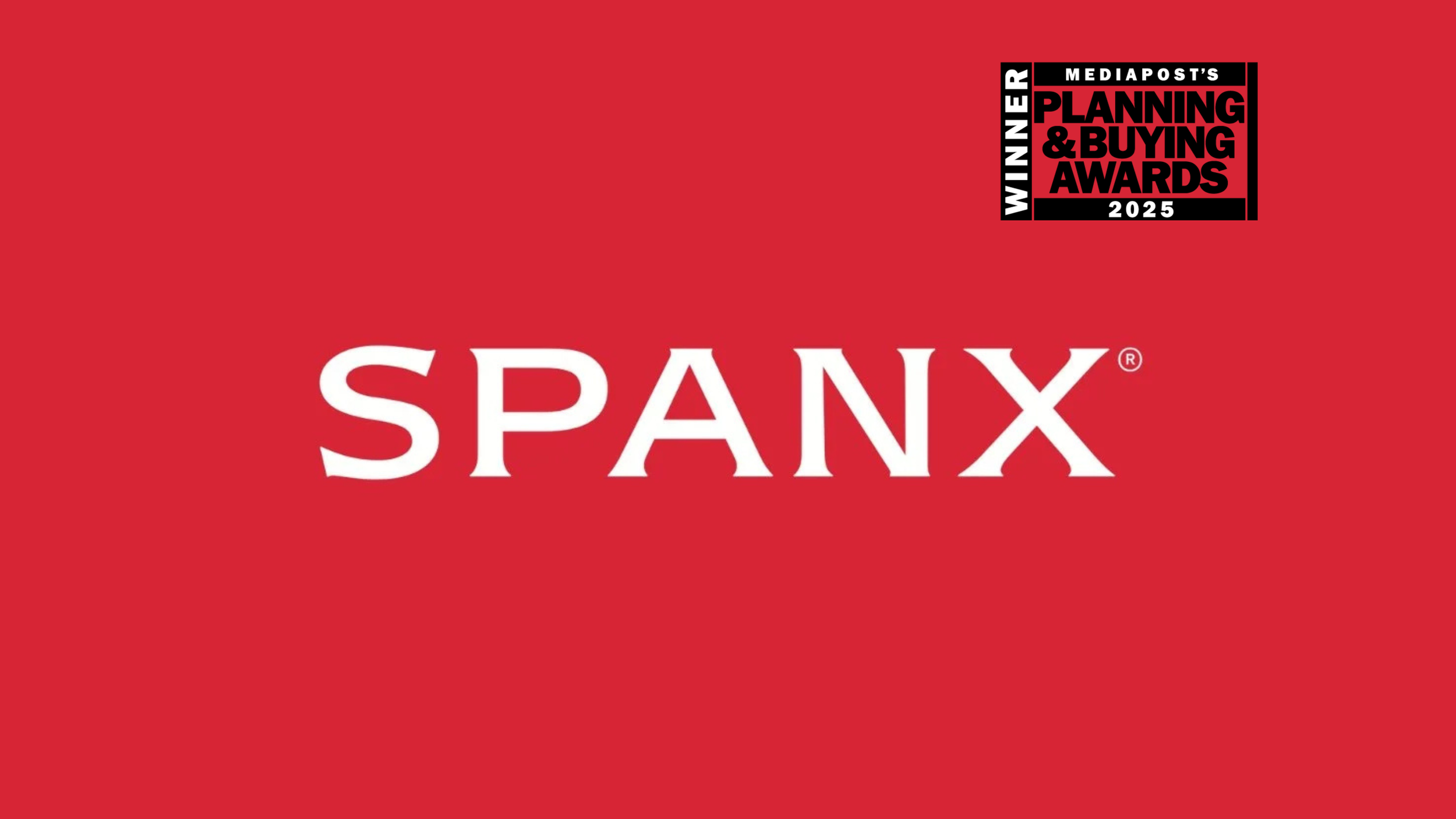 Red background with the word SPANX written in white capital letters.