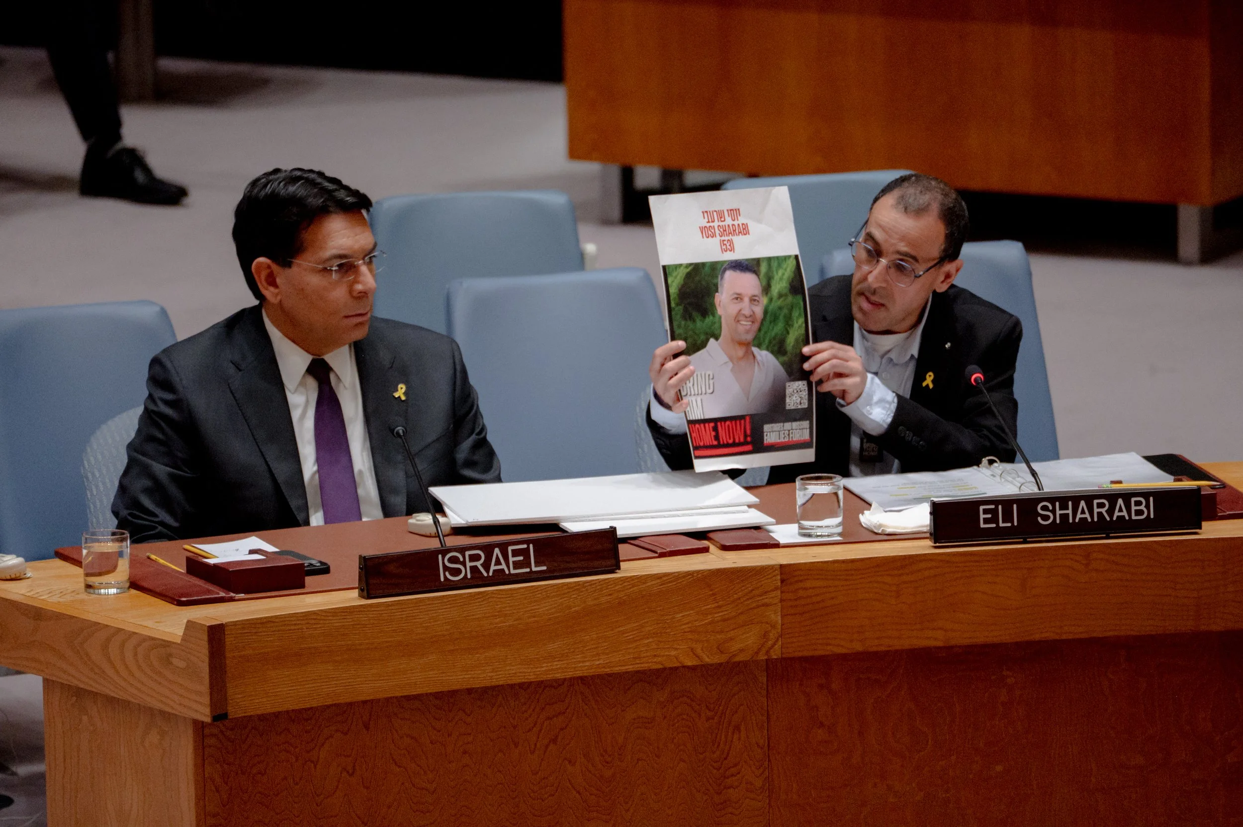 Released hostage Eli Sharabi speaking before the UN Security Council alongside Israeli UN Representative Danny Danon (March 20, 2025)