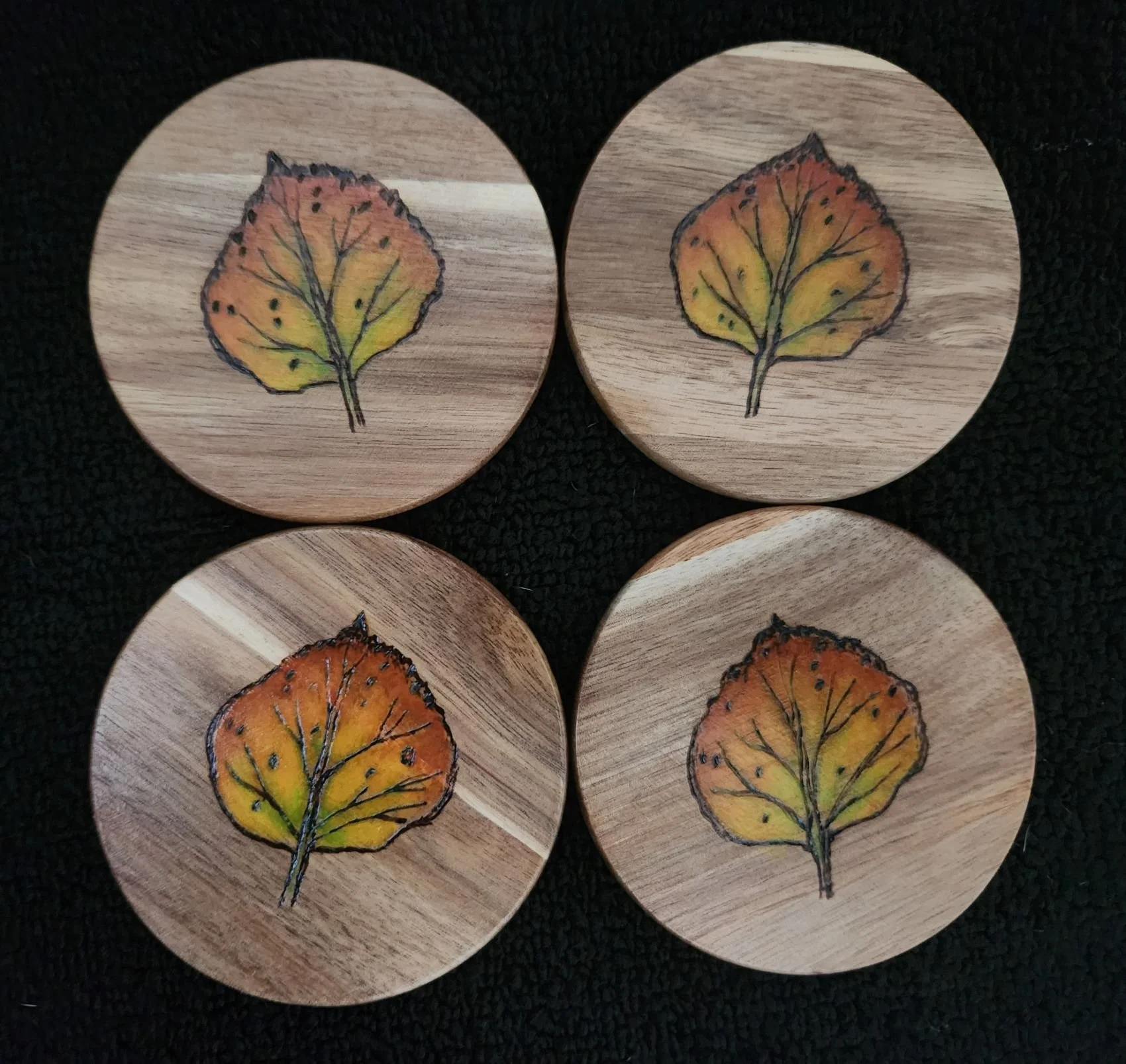 Aspen Leaf Coasters (hand painted) -
Set of 4 on acacia wood, with wooden holder
$35.00