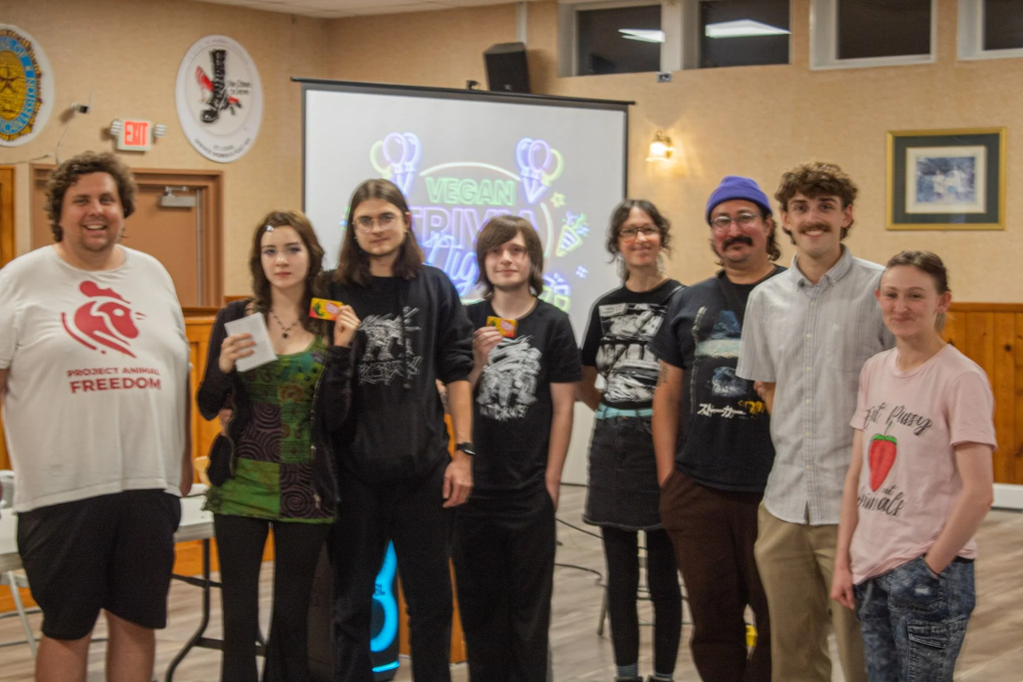 Kyle Luzynski and Alex with the winners of Project Animal Freedom's inaugual Vegan Trivia Night.jpg