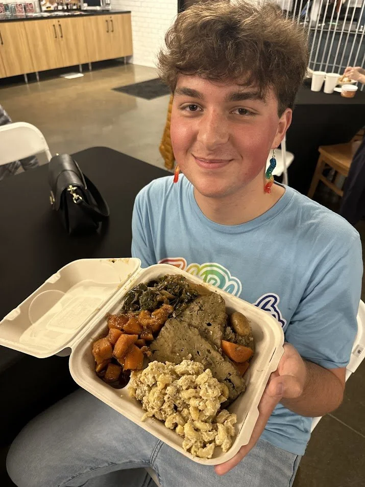Troy holding his Thanksgiving platter at our Vegan Thanksgiving Feast with Adina's Vegan Cuisine in St. Louis, Missouri.jpg