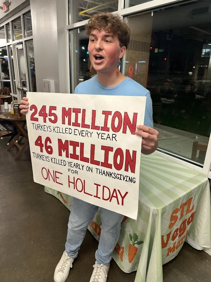 Troy discussing the number of turkeys murdered for Thanksgiving each year at our Vegan Thanksgiving Feast with Adina's Vegan Cuisine in St. Louis, Missouri.jpg